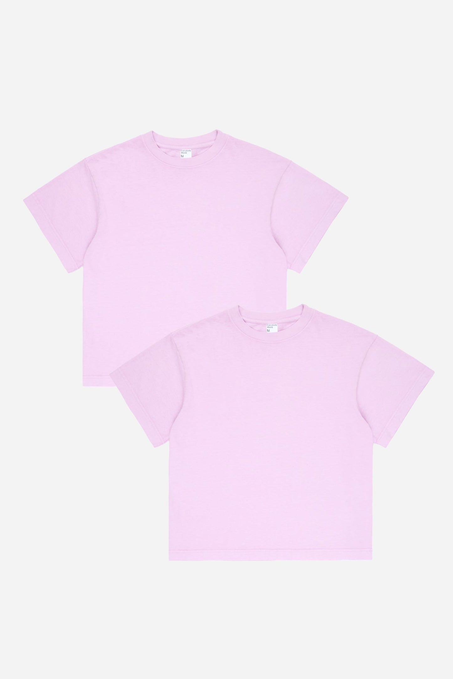 Two light purple t-shirts on a white background