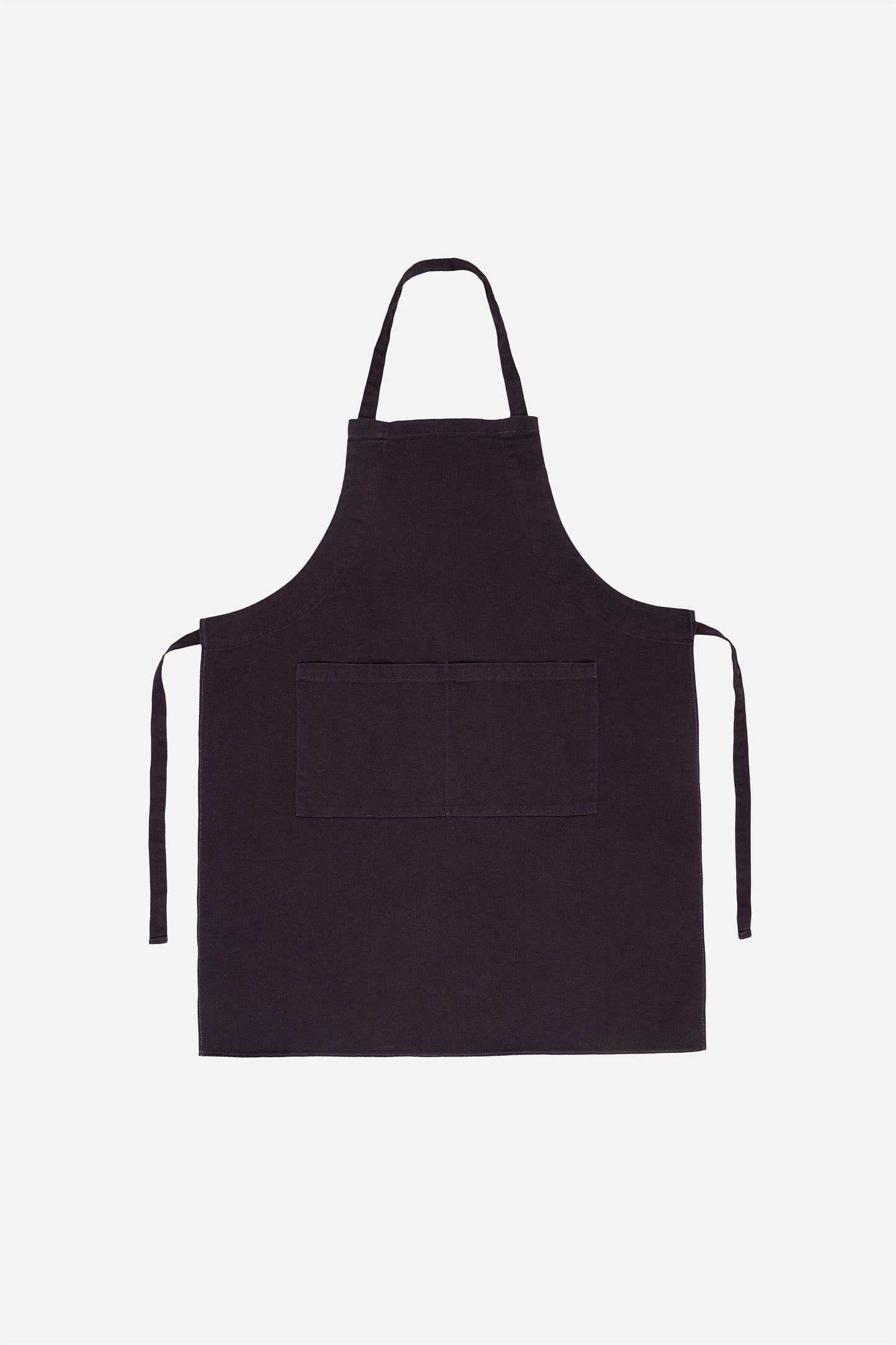 Flat lay of Adjustable Apron in Mulberry with straps untied positioned to the sides of the apron.