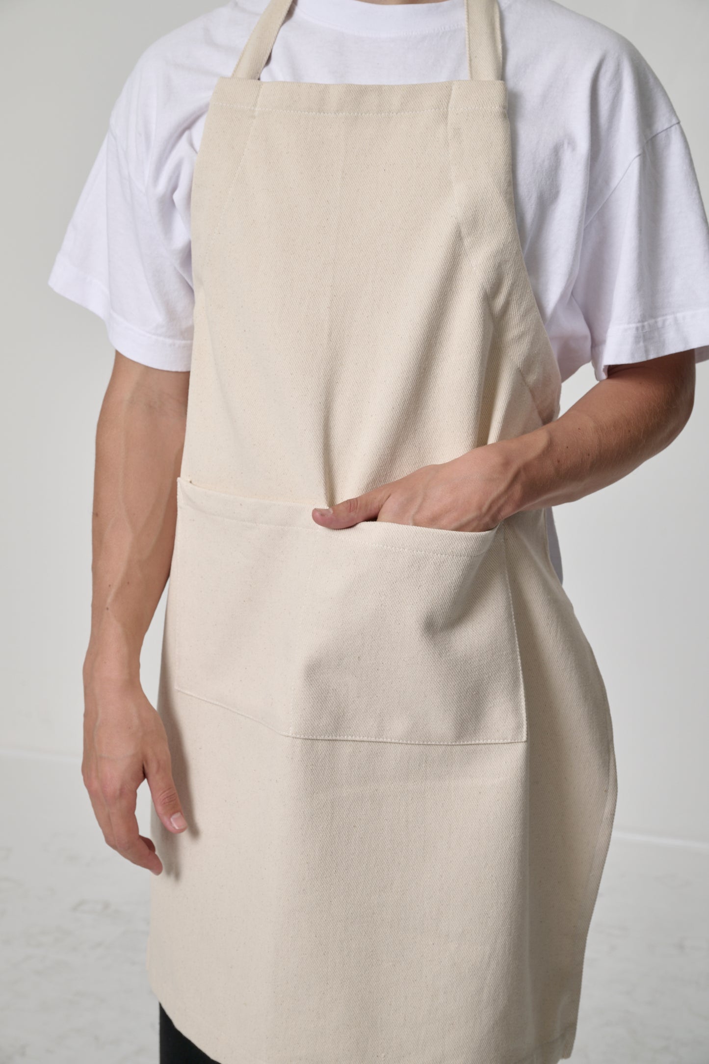 Close-up of a hand in front pocket to show depth.