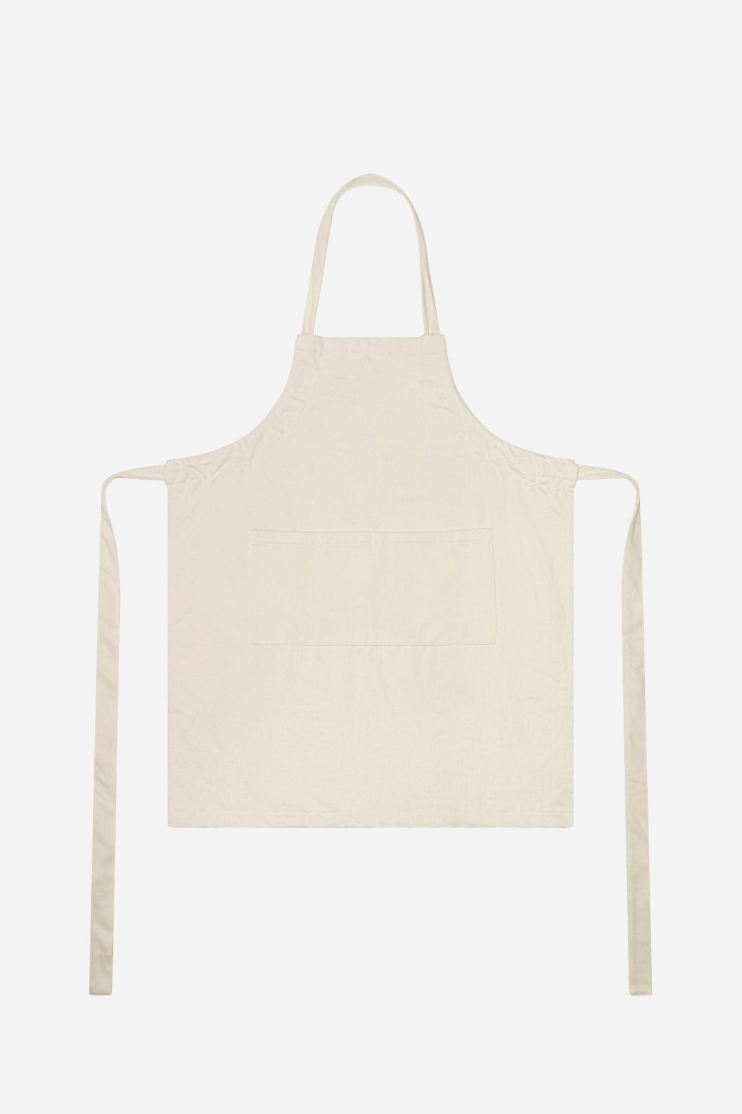Flat lay with straps untied and to the sides of the apron.