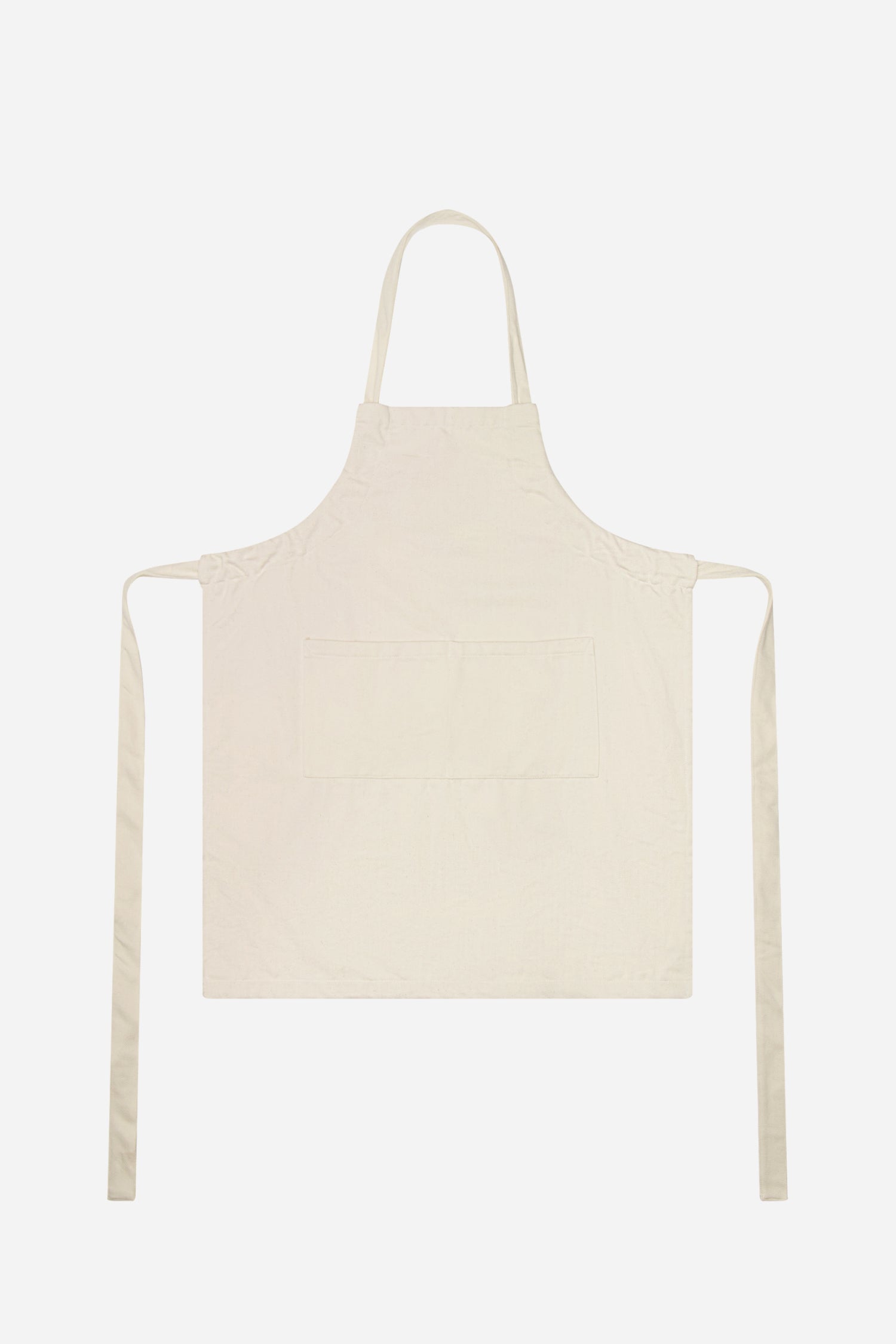Flat lay with straps untied and to the sides of the apron.