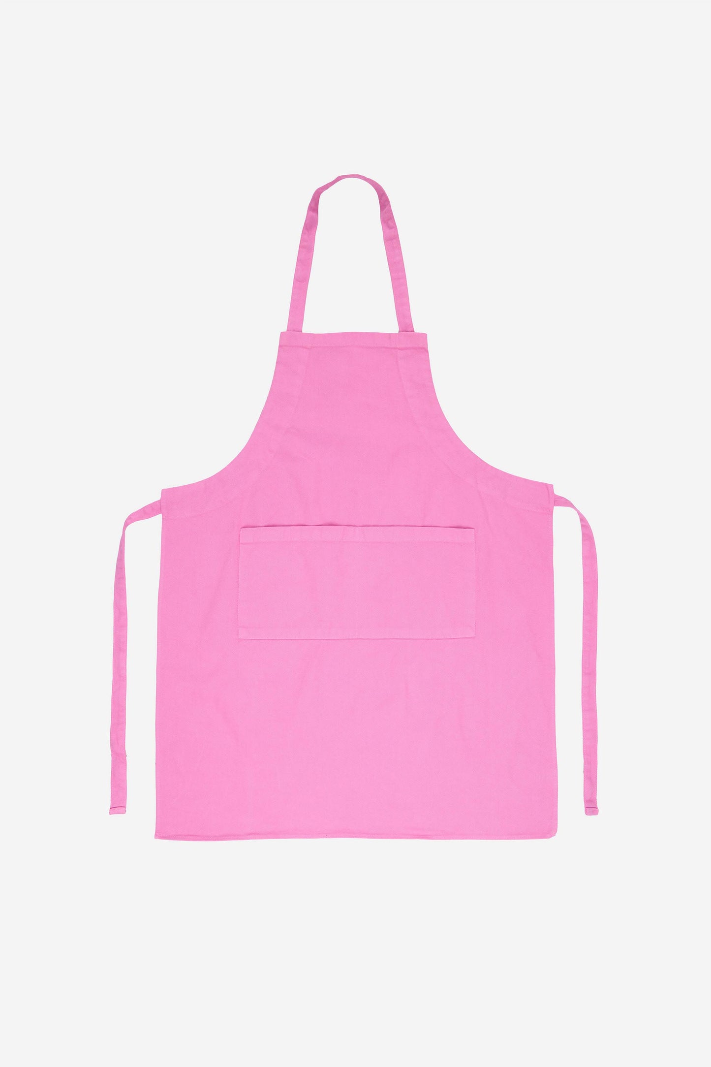Flat lay of Adjustable Apron in Pixie with straps untied positioned to the sides of the apron.