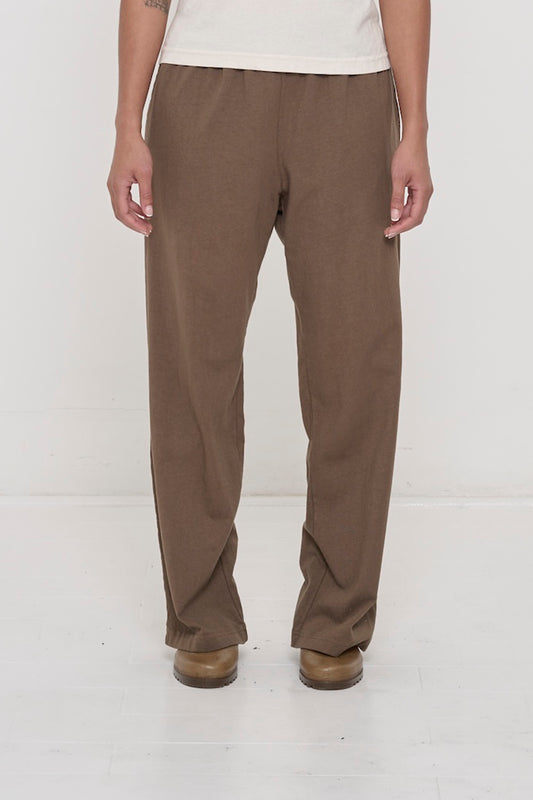 Waist down of a 5'8"person in Size M Dry Soil Apartment Pants. Hem at bottom of the heels.
