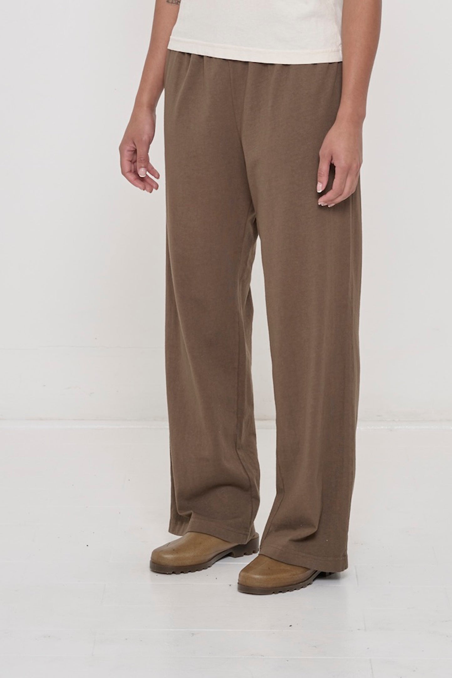 Person facing 45-degrees to the front showing inseam and outseam.