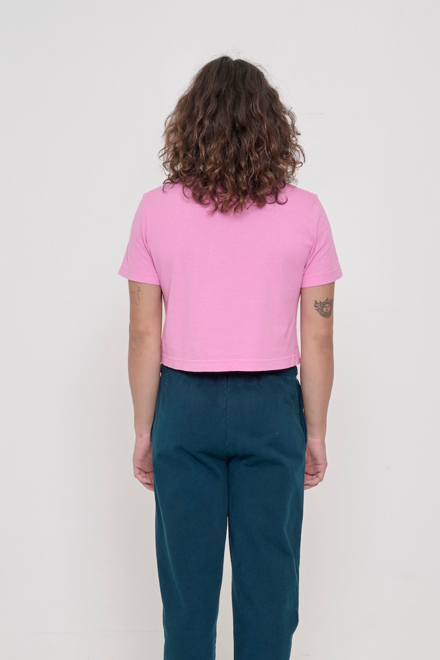 Back view showing loose fit at lower back.