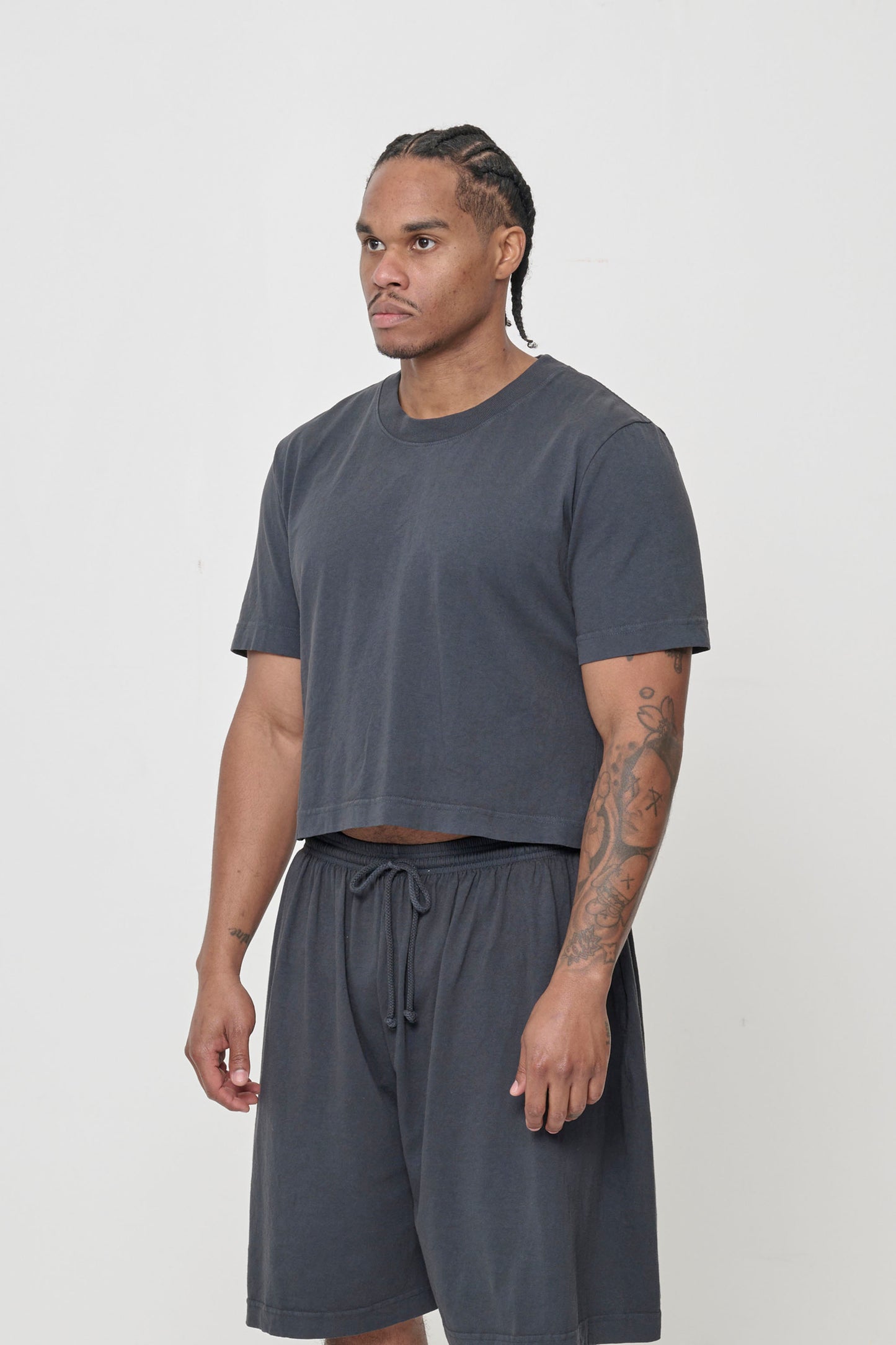 3/4 front view showing relaxed yet slim short sleeves and side seams.