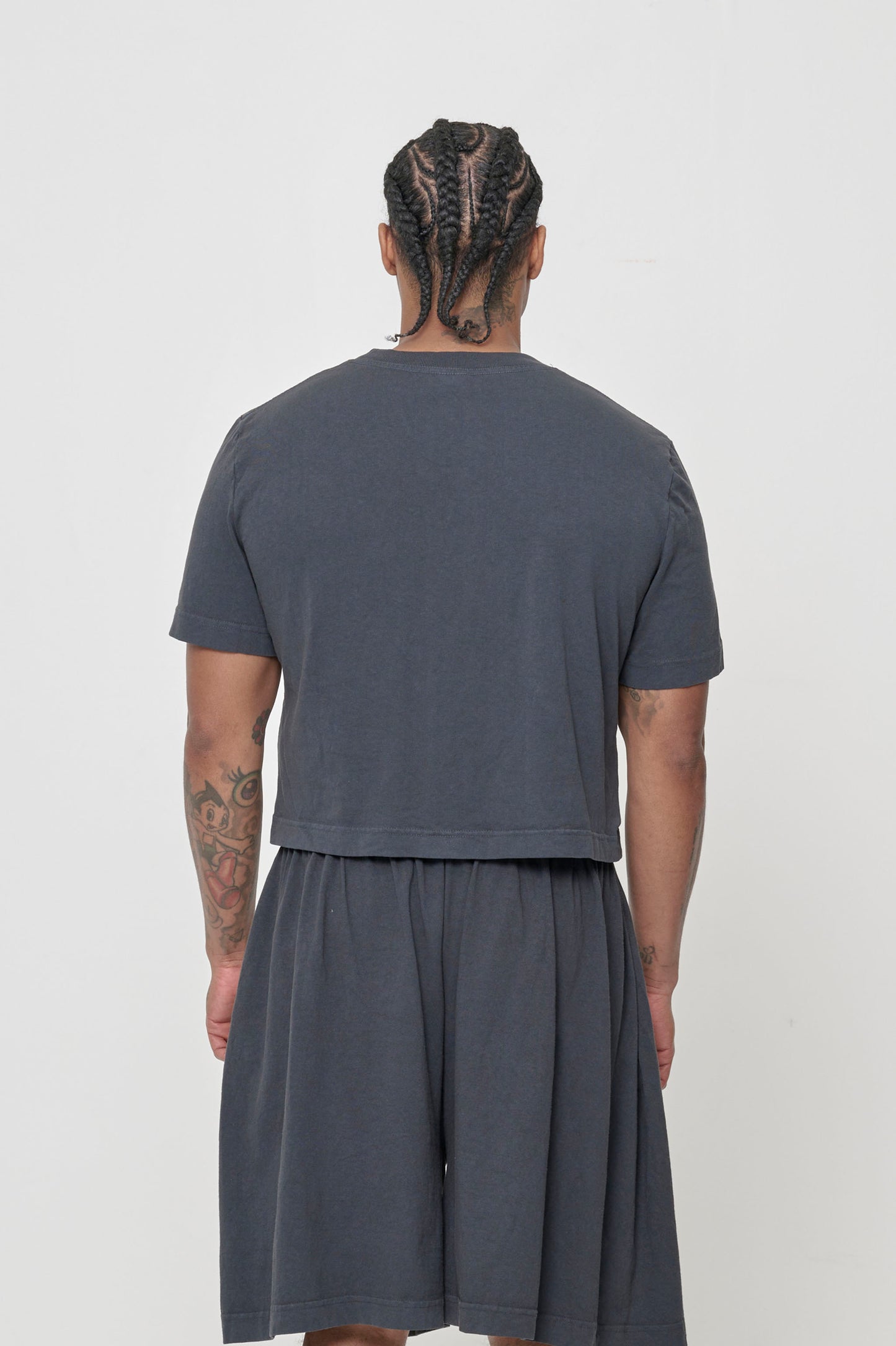 Back view, fitted across upper back and relaxed at middle and lower back