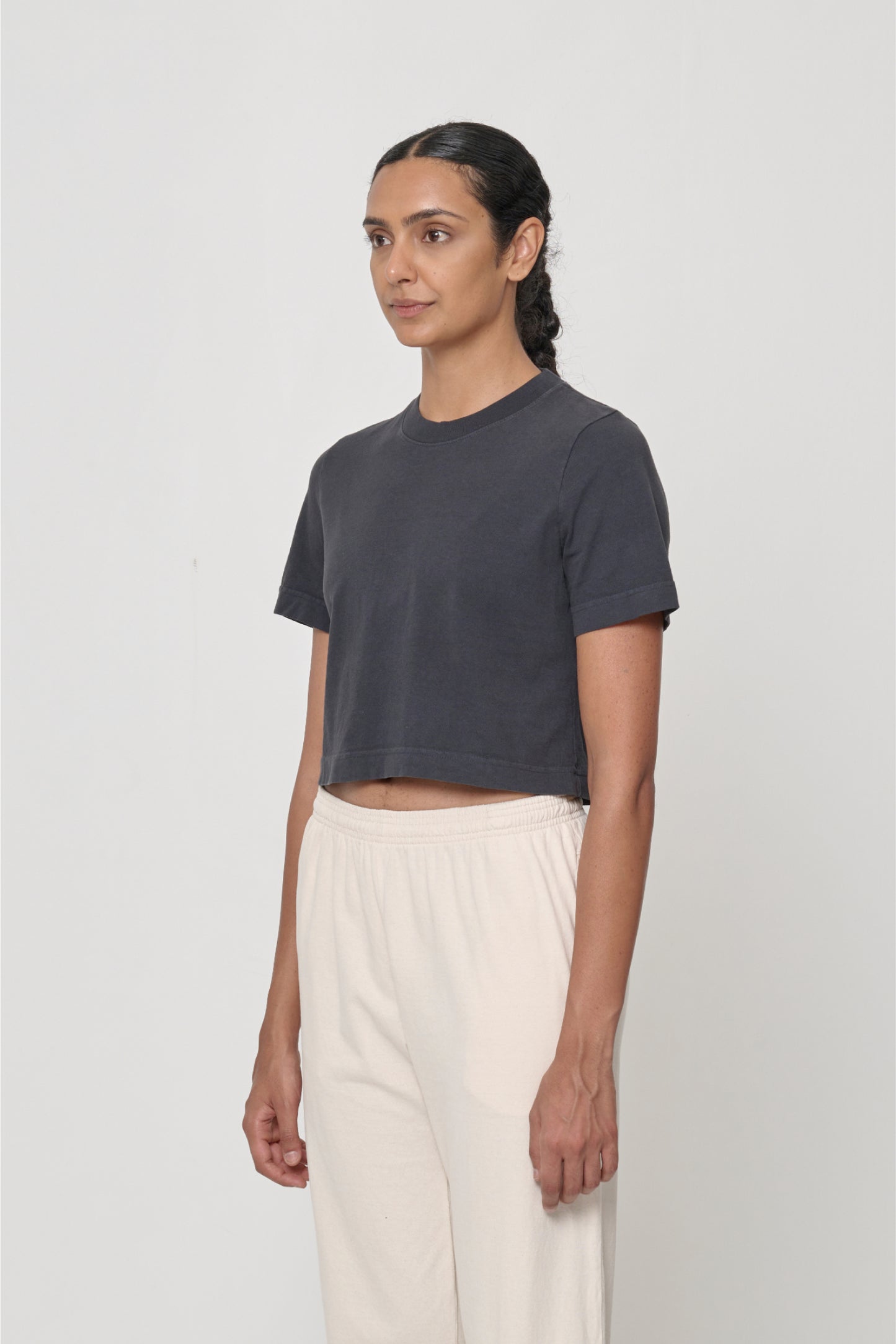 3/4 front view showing relaxed yet slim short sleeves and side seams.