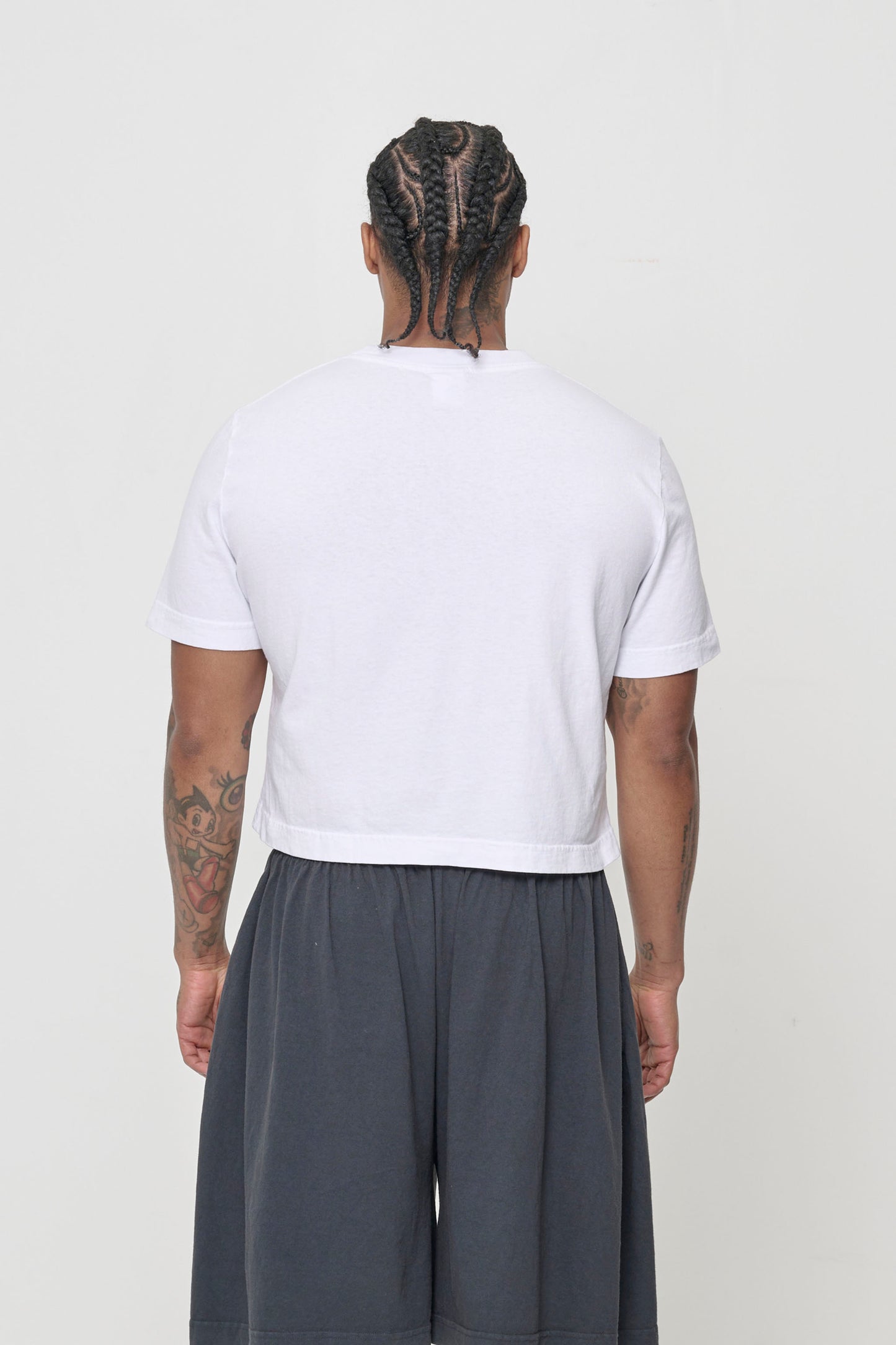 Back view showing narrow while still relaxed fit at lower back, and more fitted at the upper back.