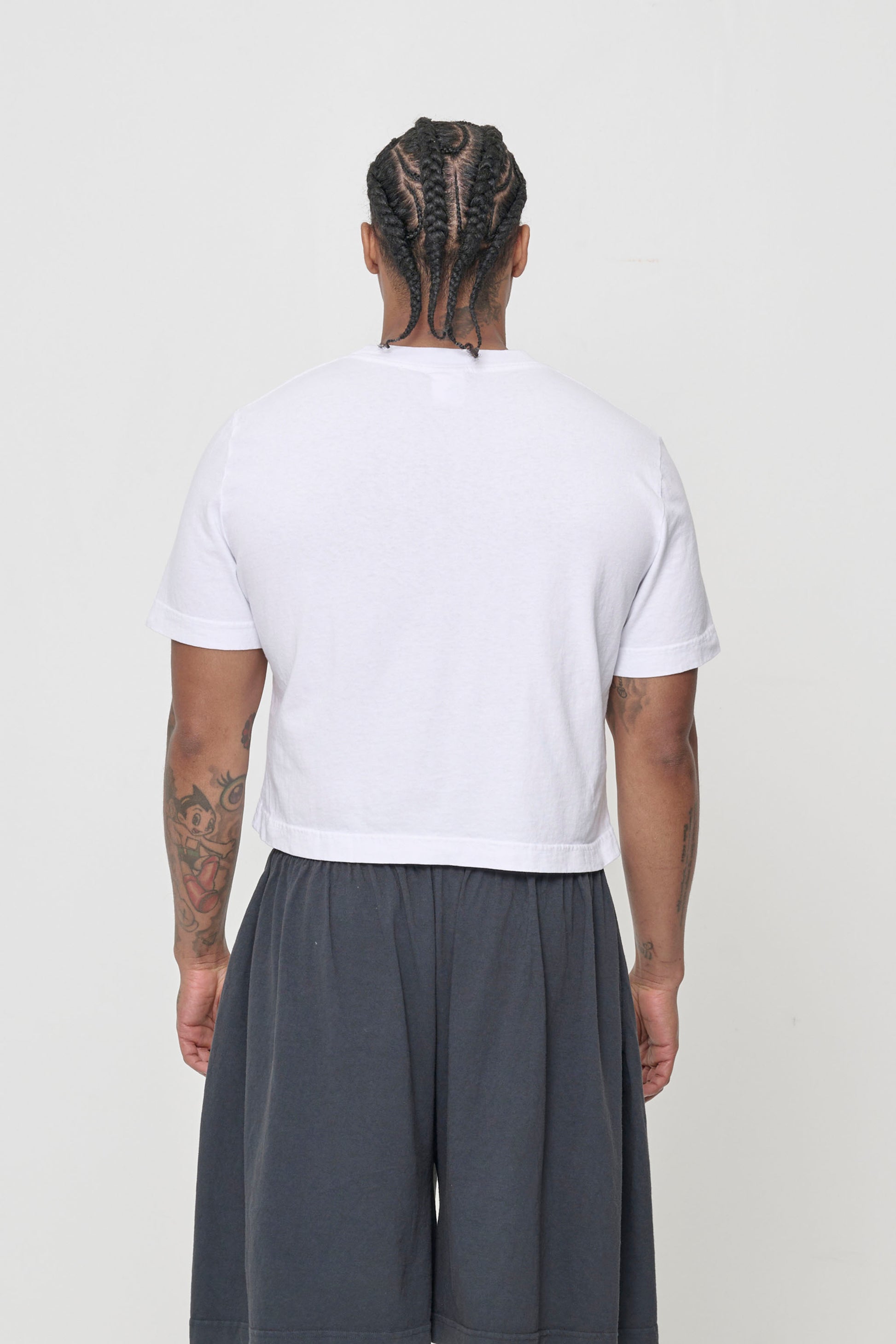 Back view showing narrow while still relaxed fit at lower back, and more fitted at the upper back.