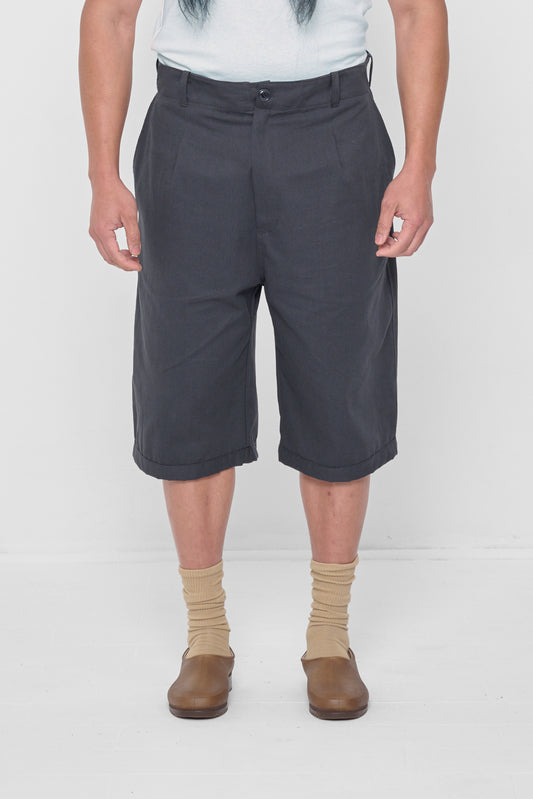5'11" person in size XL Slate Bermuda Shorts. Hem ends at upper calves.