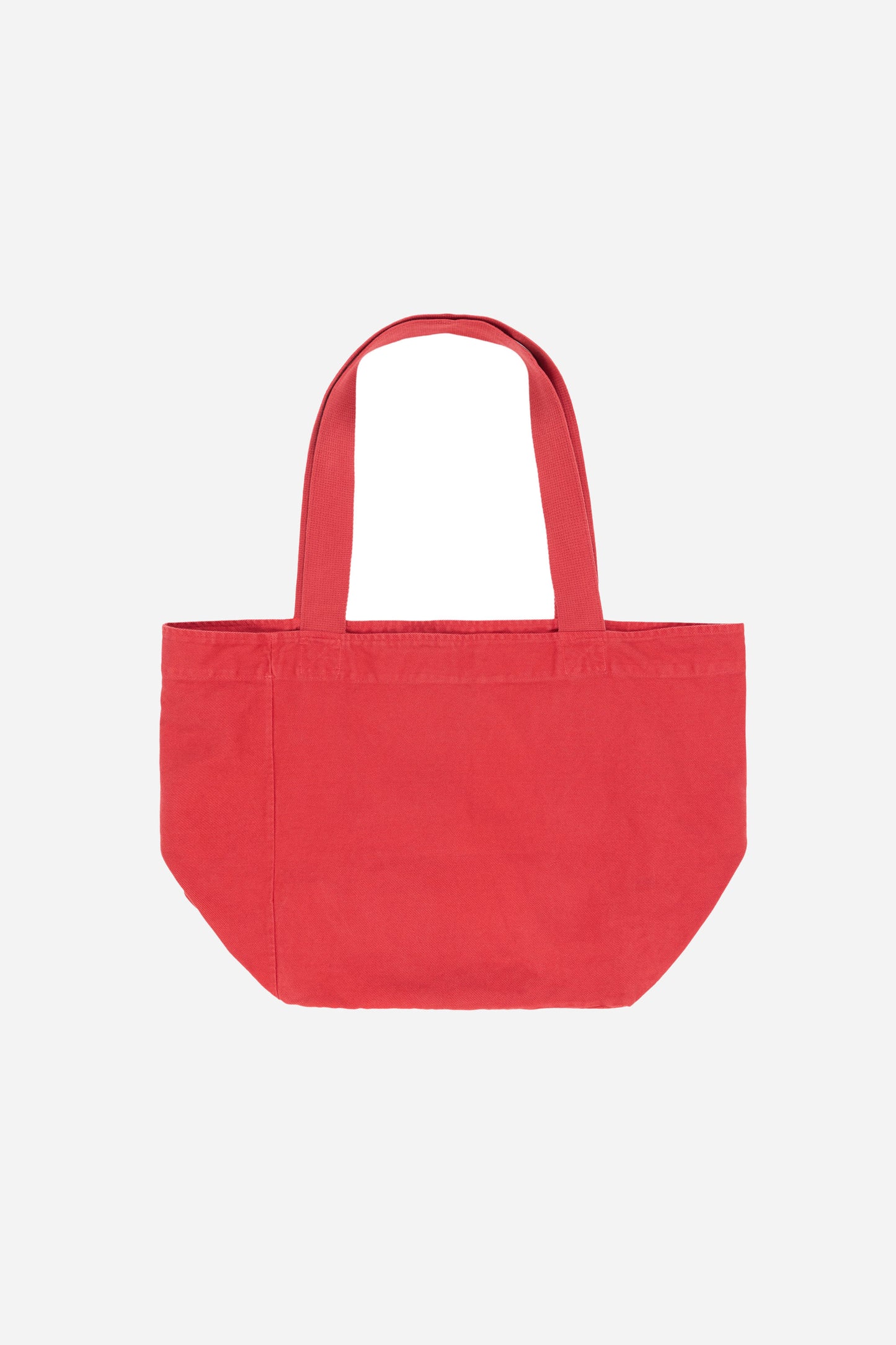 Flat lay of Big Tote in Cedar orange-red, showing depth, stitching, and web straps.