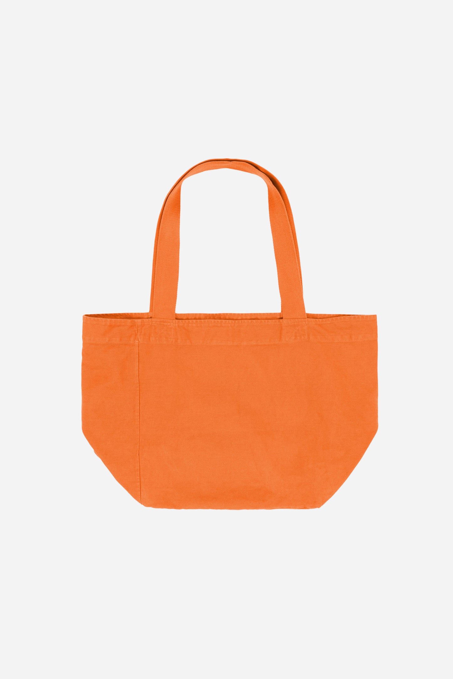 Flat lay of Big Tote in Persimmon orange, showing depth, stitching, and web straps.