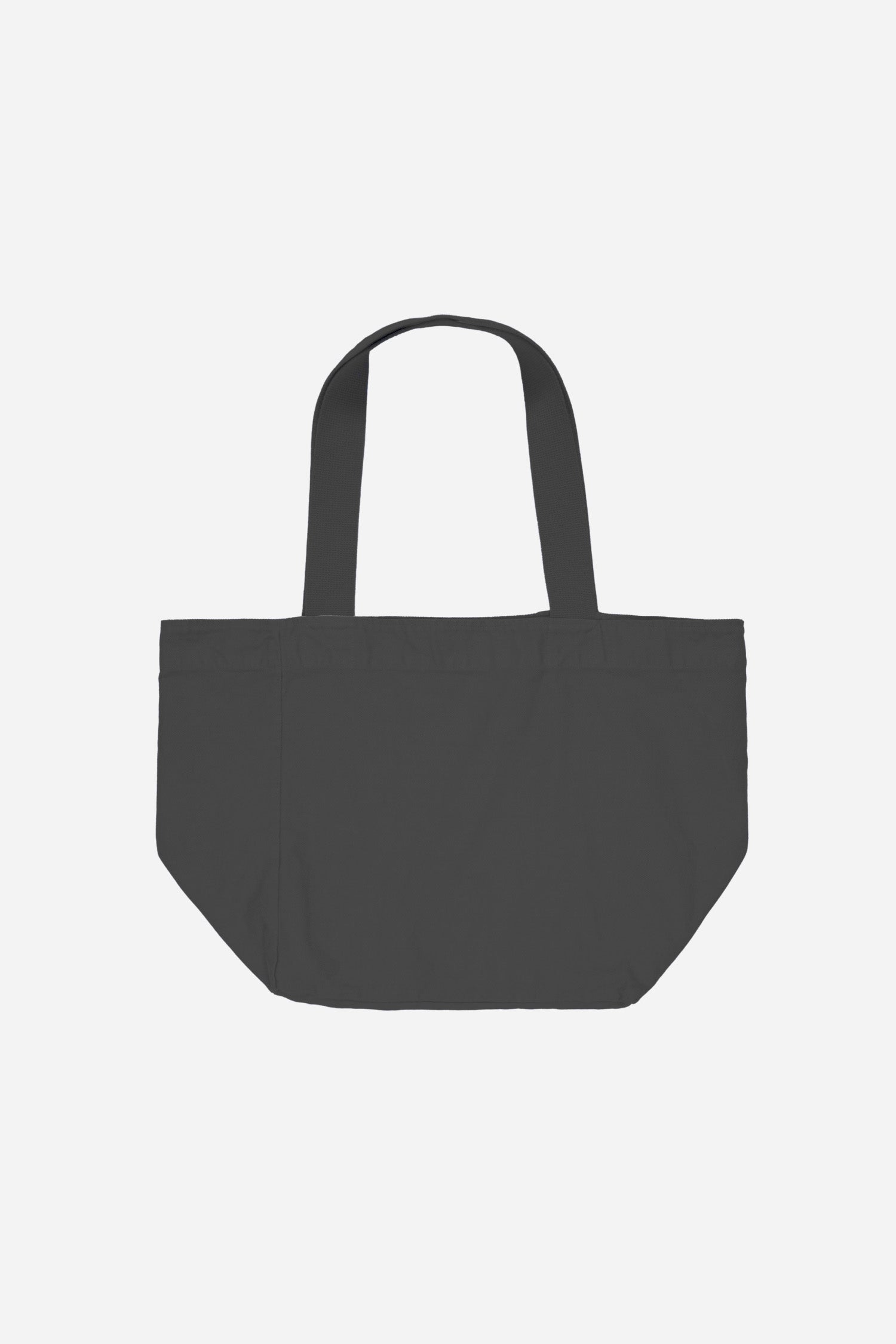 Flat lay showing depth, stitching, and web straps.