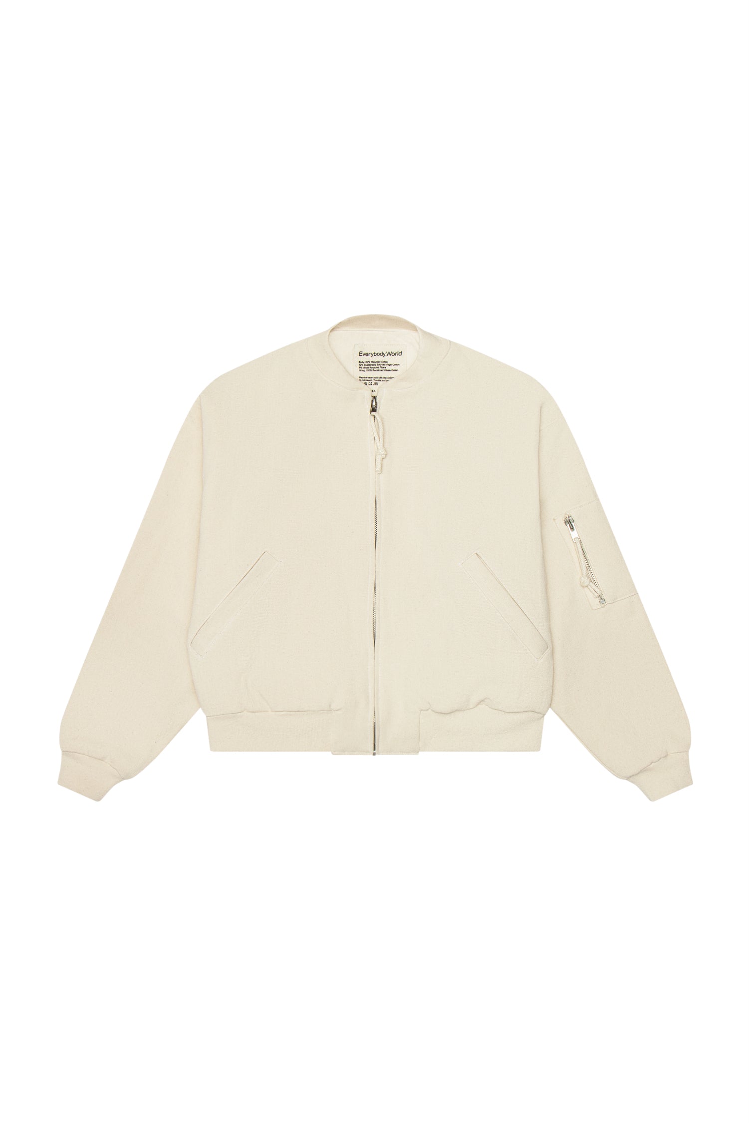 Flat lay of the Biodegradable Bomber Jacket in Natural, showing the front of the jacket, the metal zip hardware and pockets.