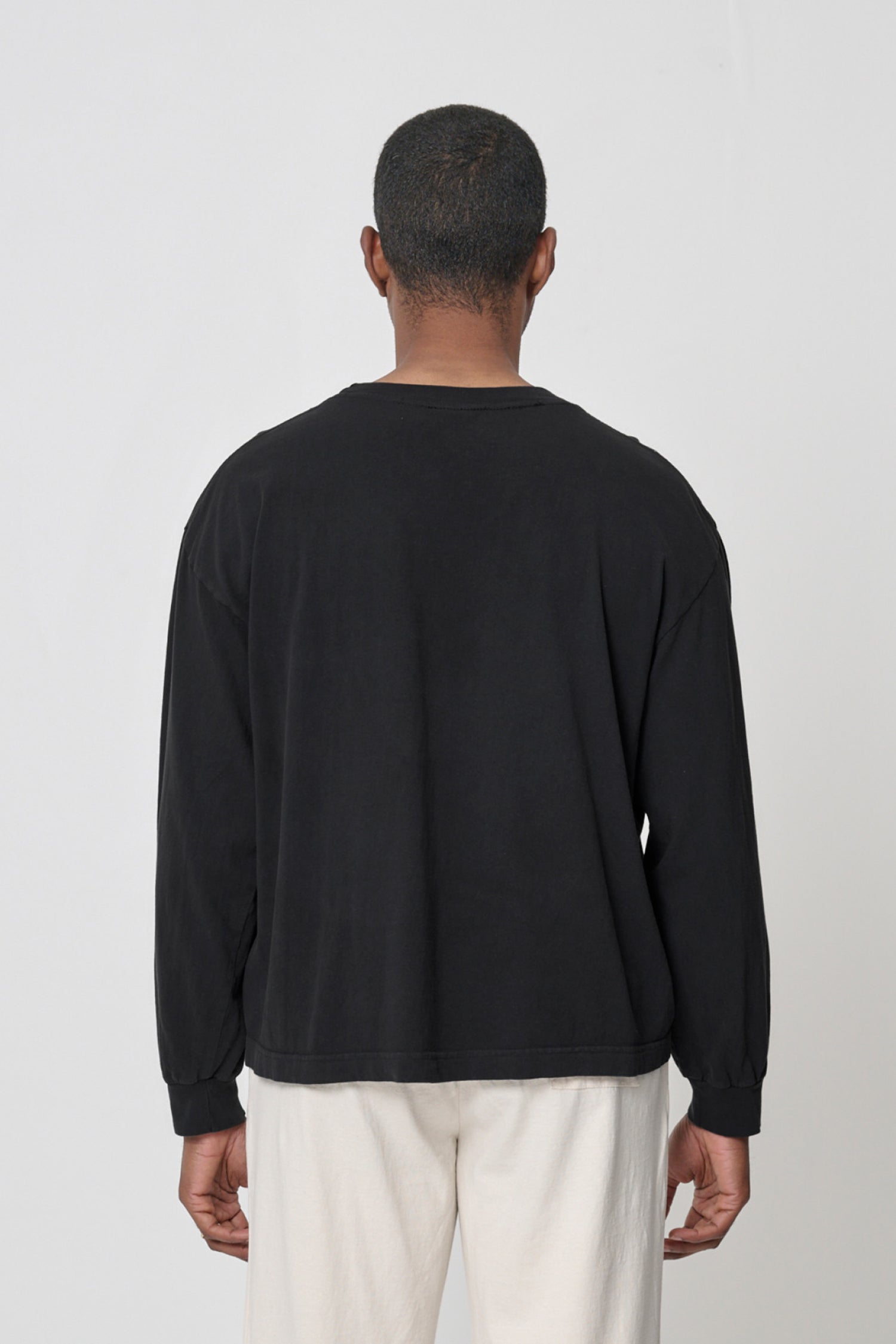 Back view showing relaxed drape of the fabric.