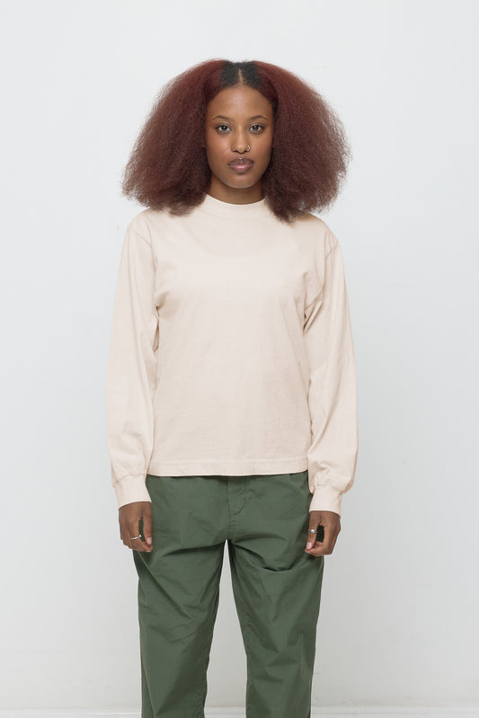 A 5'3" woman in an XS Scour Long Sleeve Boxier Trash Tee. Hem hits her upper-middle hip.