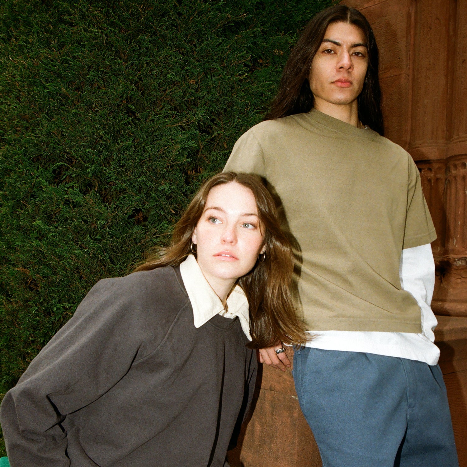 Two models outdoors in New York wearing the Trash Collection