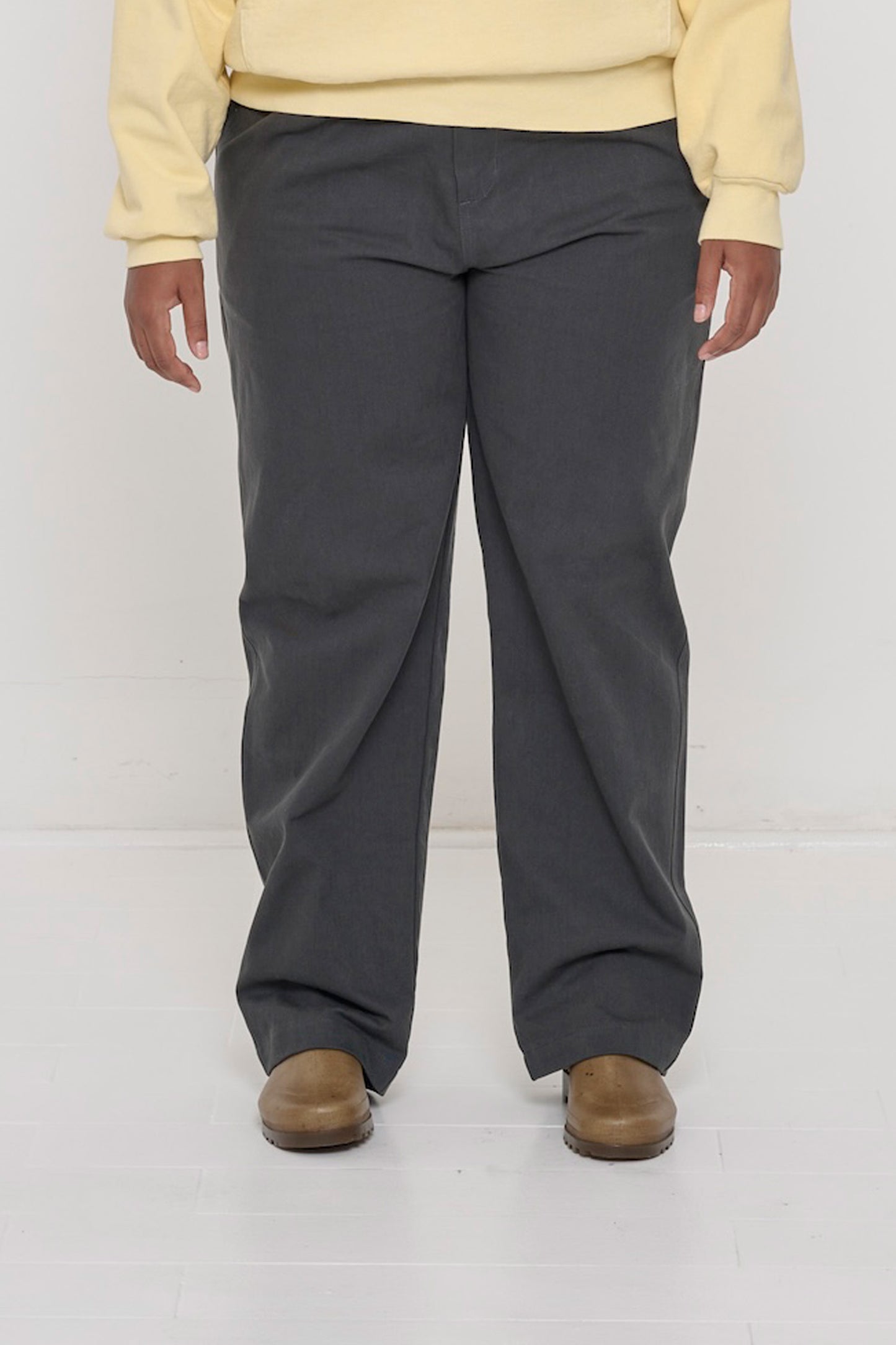 Bottom half of a person wearing Cotton Twill Life Uniform Pants in Slate.