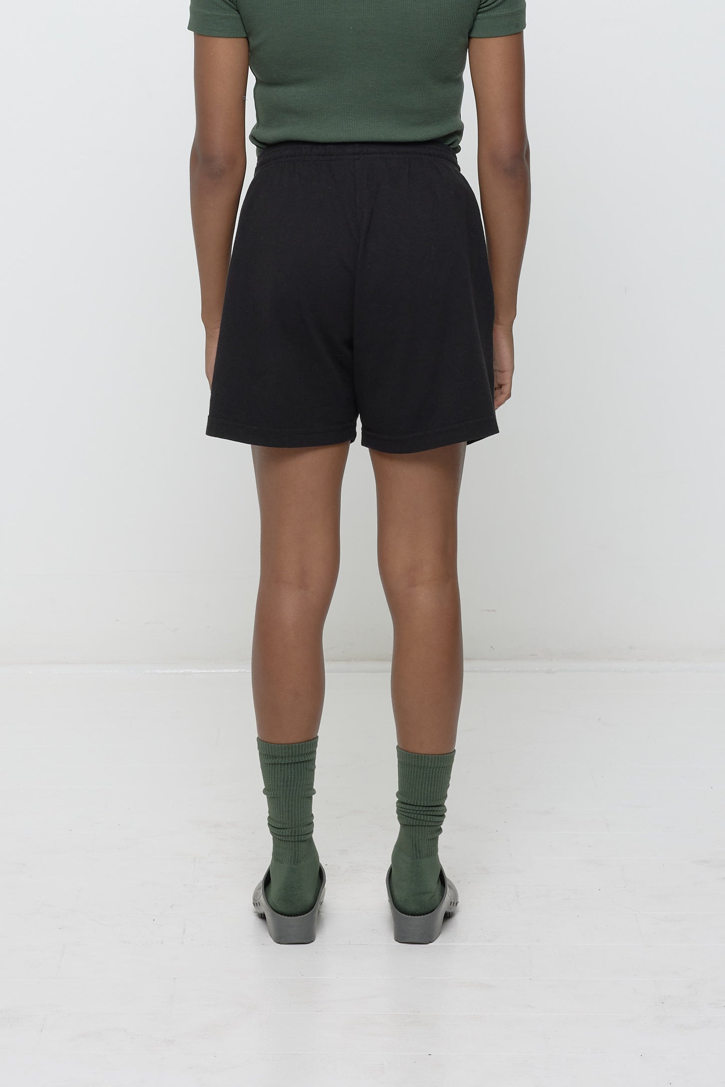 Back view highlights fabric texture and waistband.