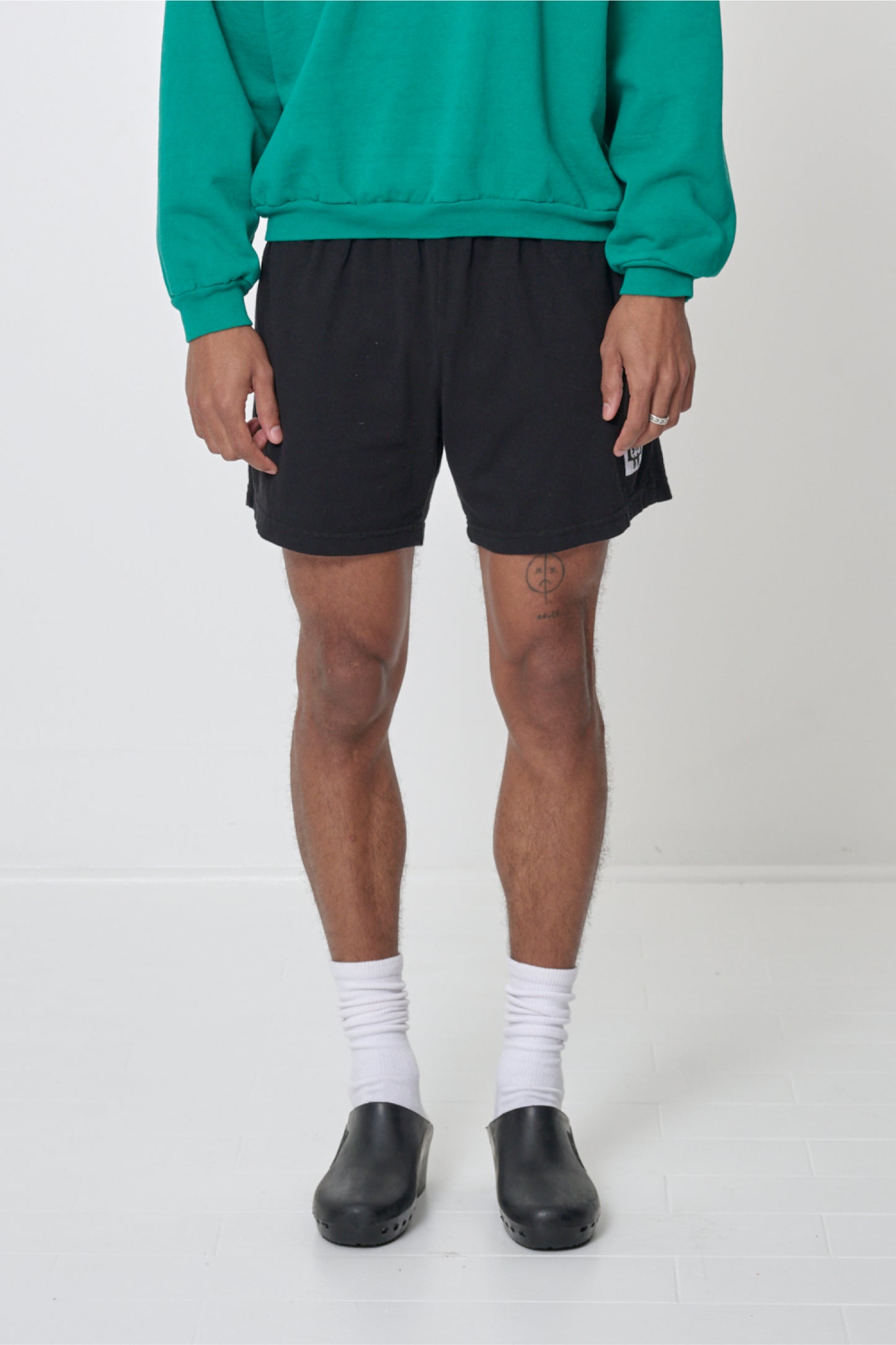 Black Everyday Shorts shows relaxed fit.