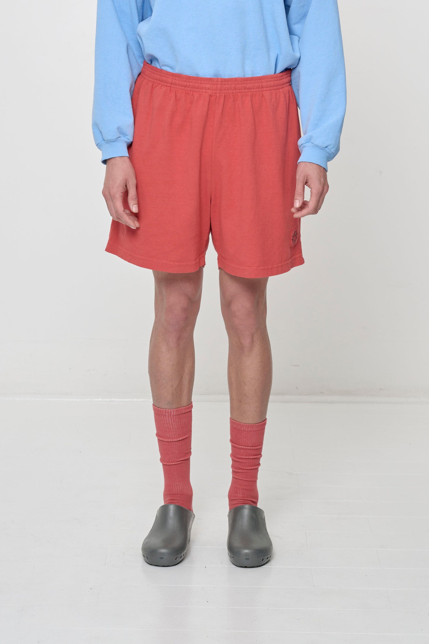 Orange-red Cedar Everyday Shorts shows relaxed fit.
