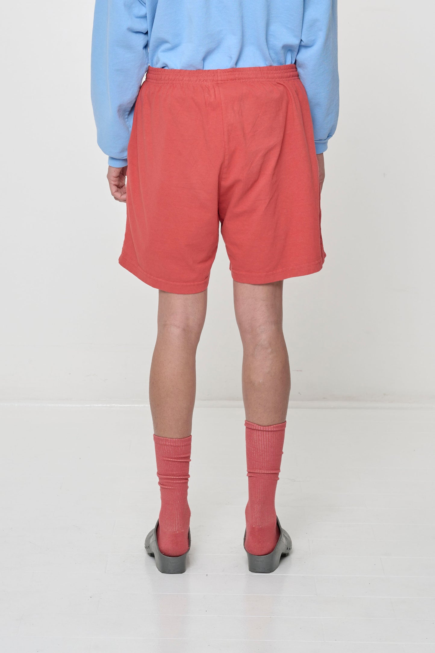 Back view highlighting elastic waist and relaxed fabric drape.