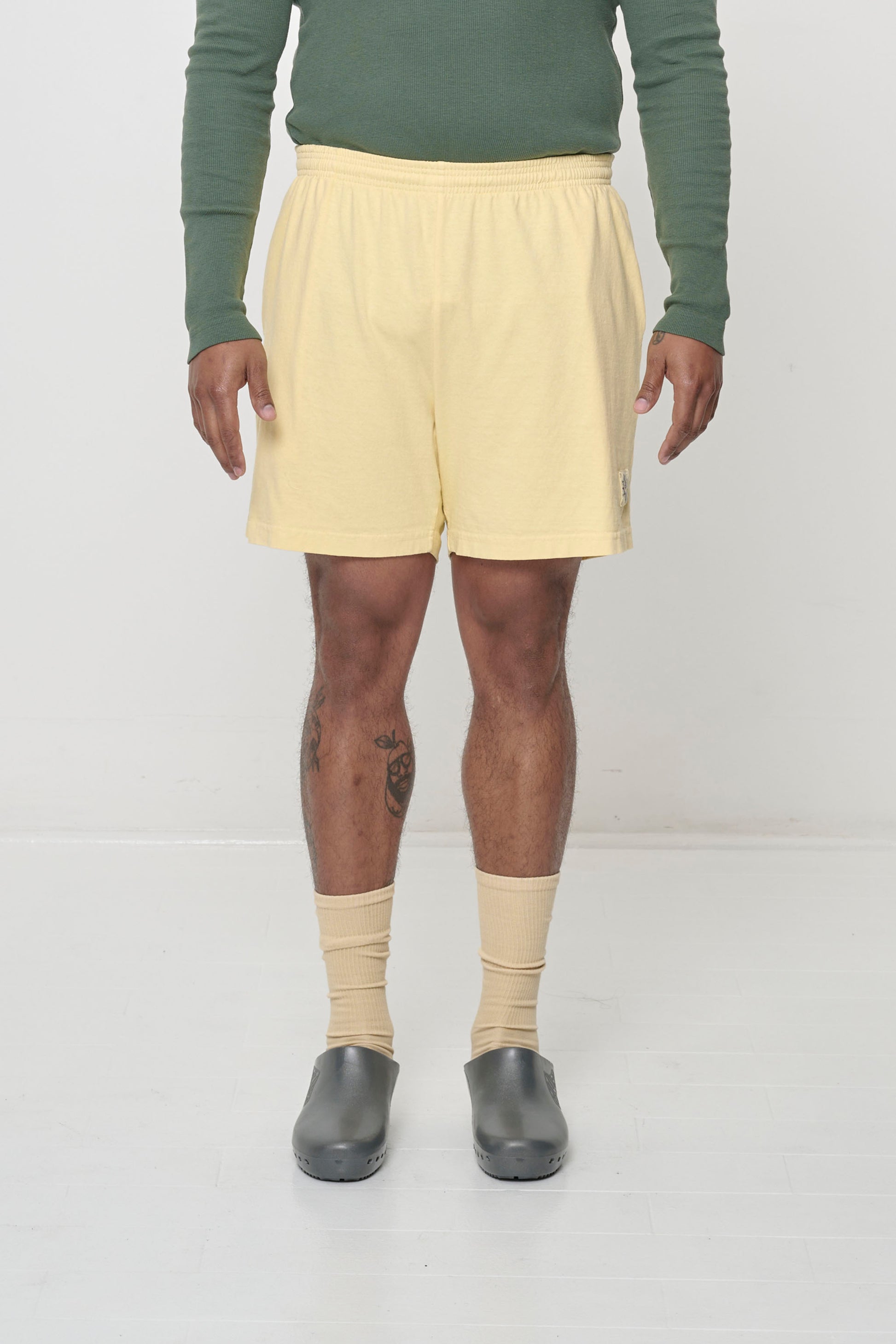 Light yellow French Butter Everyday Shorts shows relaxed fit.