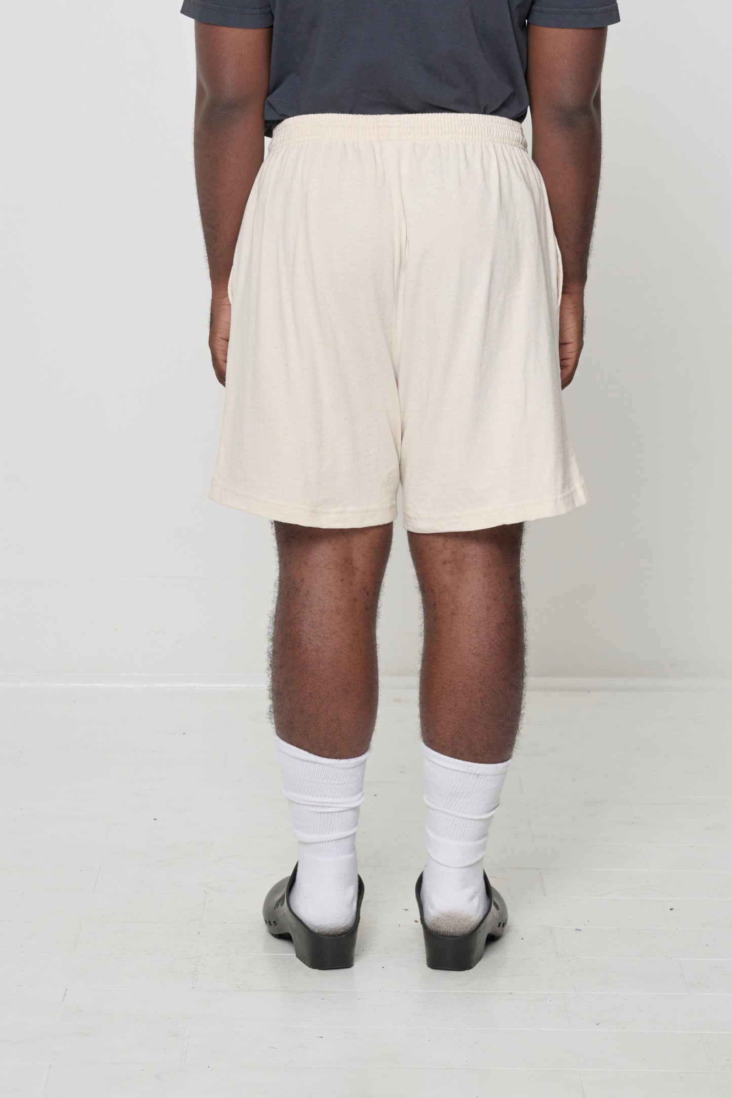 Back view highlighting relaxed fabric drape.