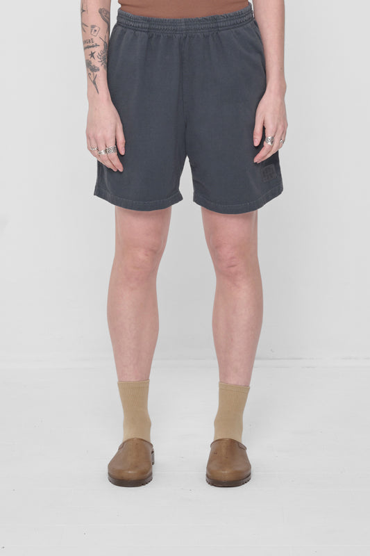 5'6" woman wearing size M Slate Everyday Shorts. Leg hem hits he at mid thigh.
