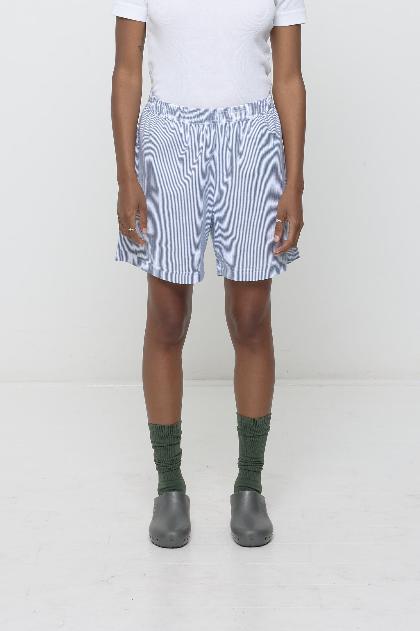 Stripe Poplin Everyday Shorts size S on a 5'3" model, front. Hem hits her lower mid thigh.