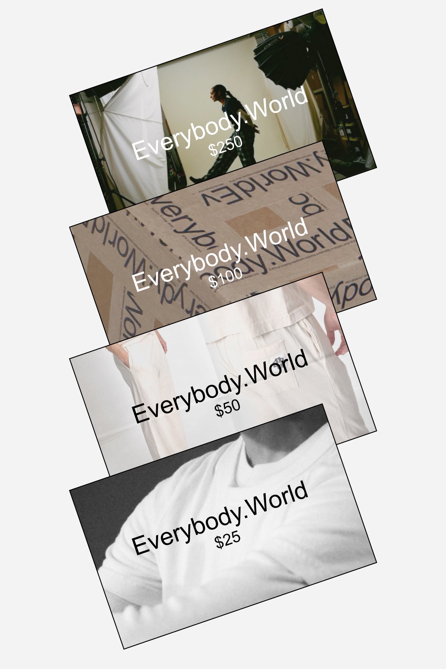 Four Everybody.World gift card partially stacked on top of each other, showing values of $25, $50, $100 and $250
