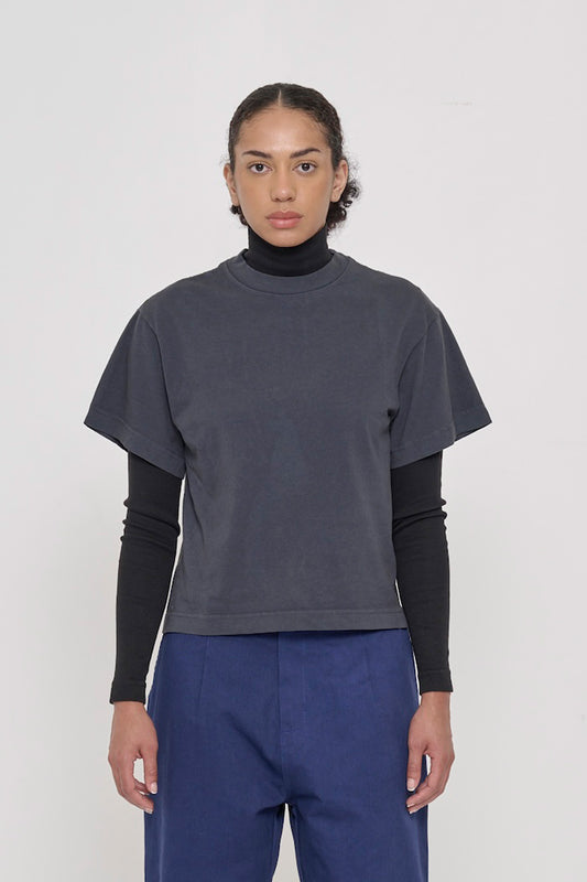 A 5'8" woman in a Slate Heavyweight Boxier Trash Tee in size XS. Bottom hem is at her upper hip.