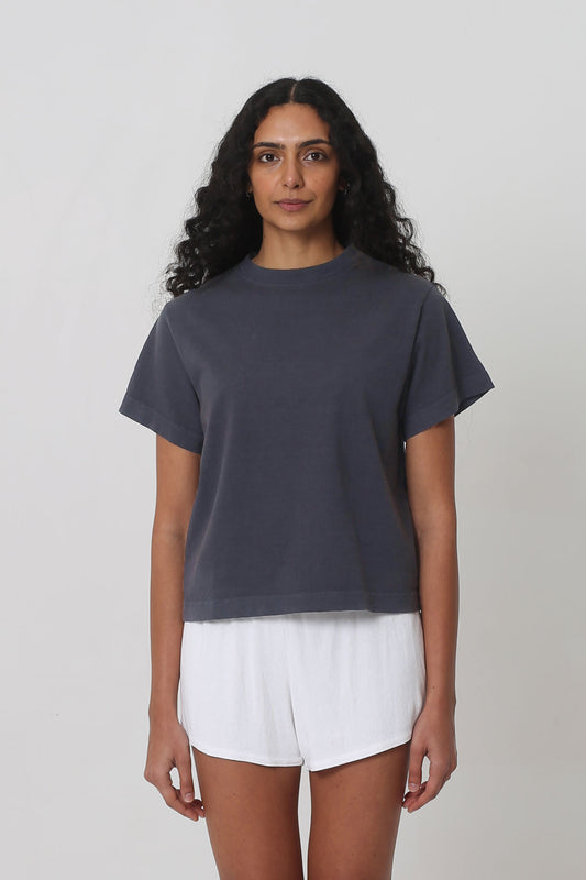 5'10" woman in a size XS Slate Heavyweight Boxier Trash Tee. Hem is at her upper hip.