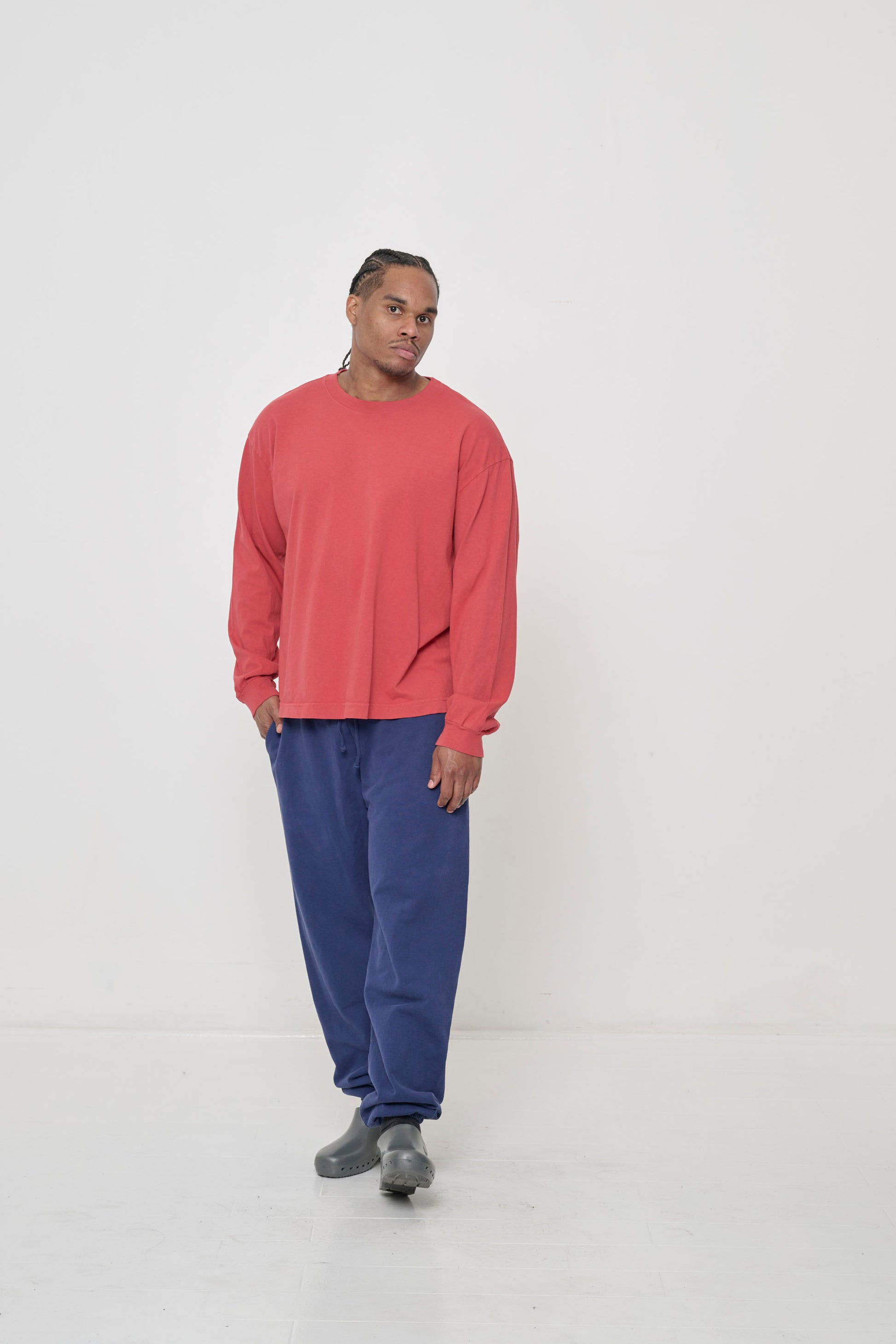 Styled with Trash Sweatpants and Calzuro Classic Clogs.