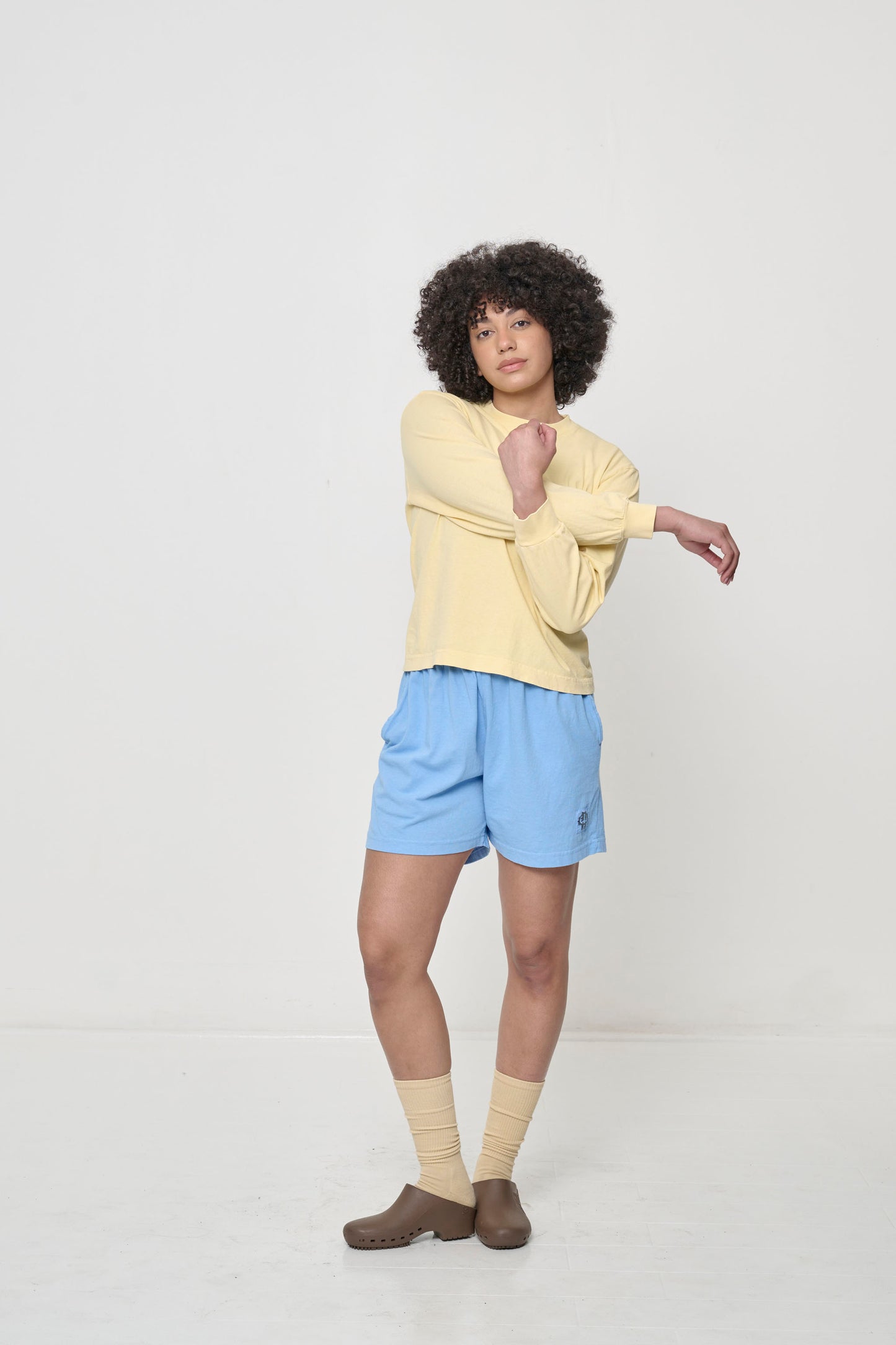 Forearms crossed in front shows easy movement in the shirt.