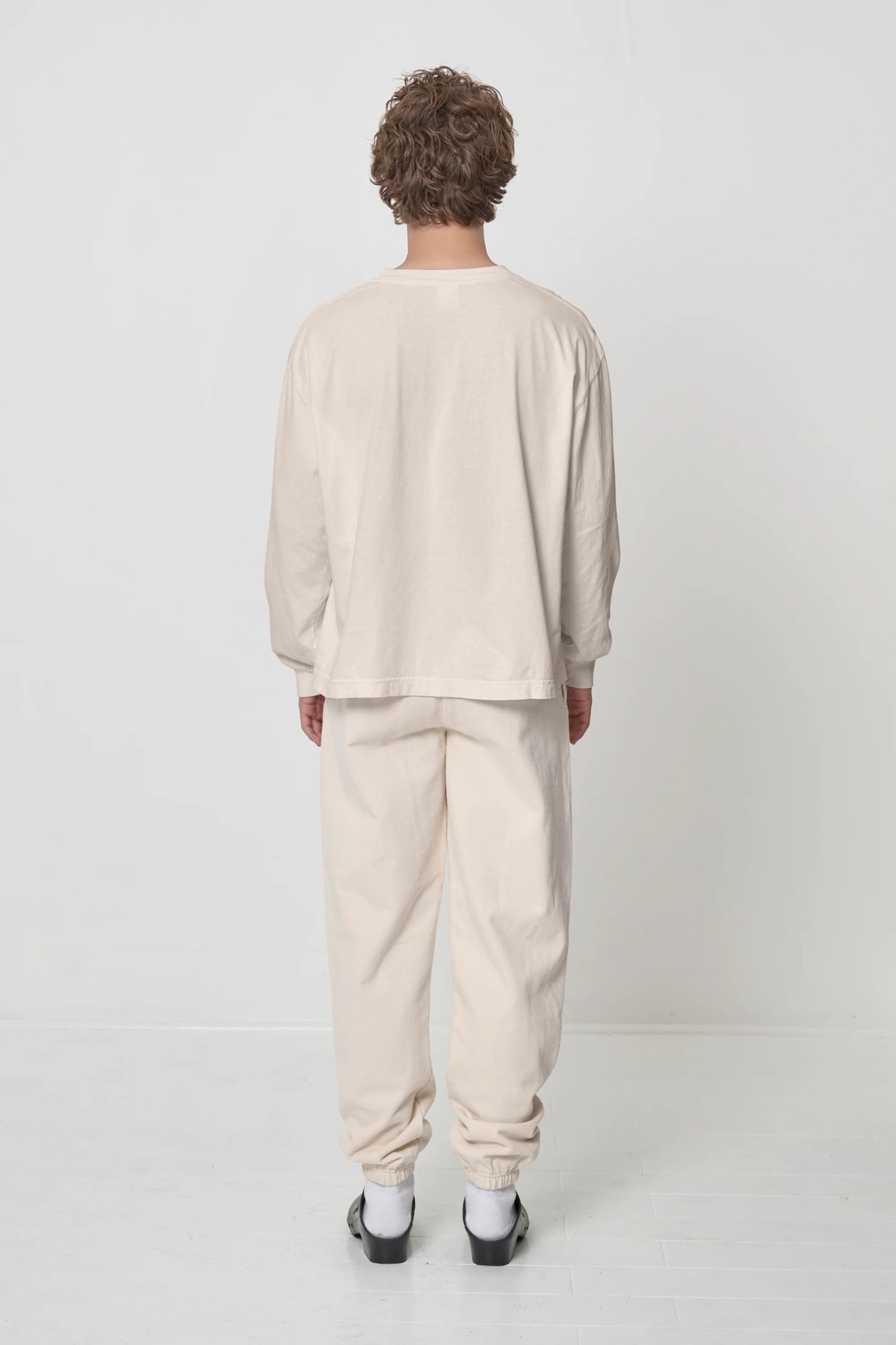 Back view showing drapy relaxed fit.