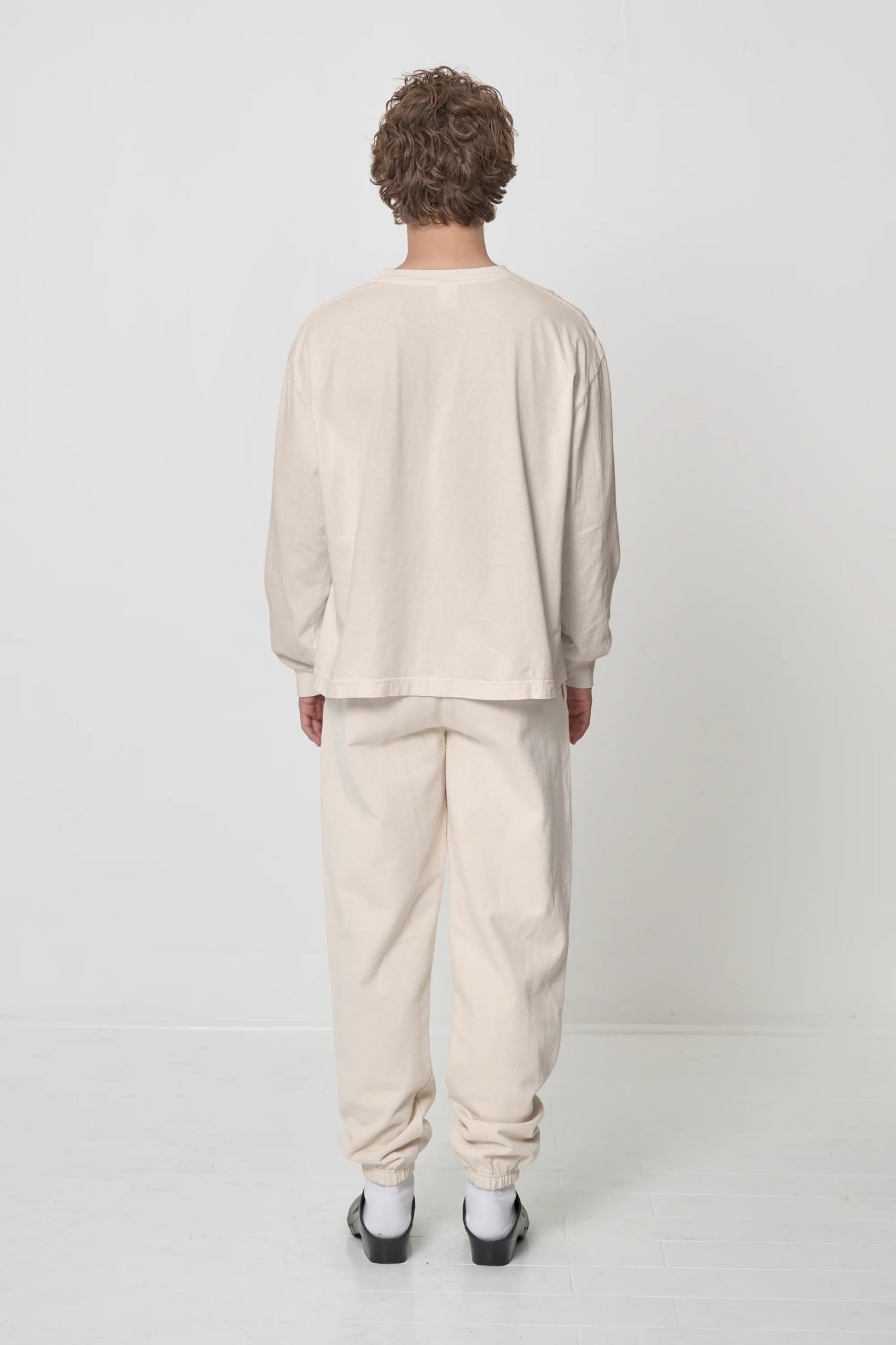 Back view showing drapy relaxed fit.