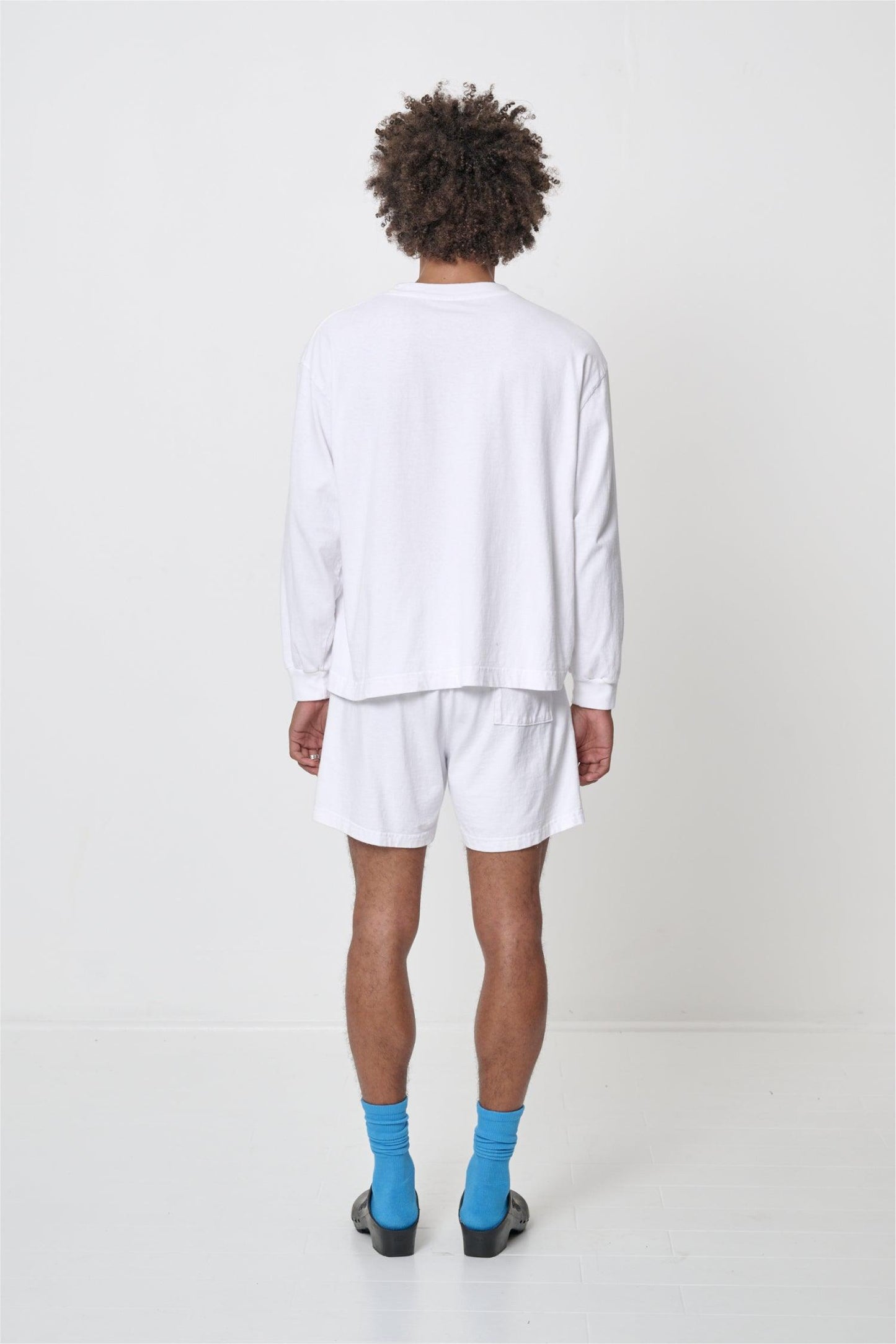Back view shows relaxed fit throughout.
