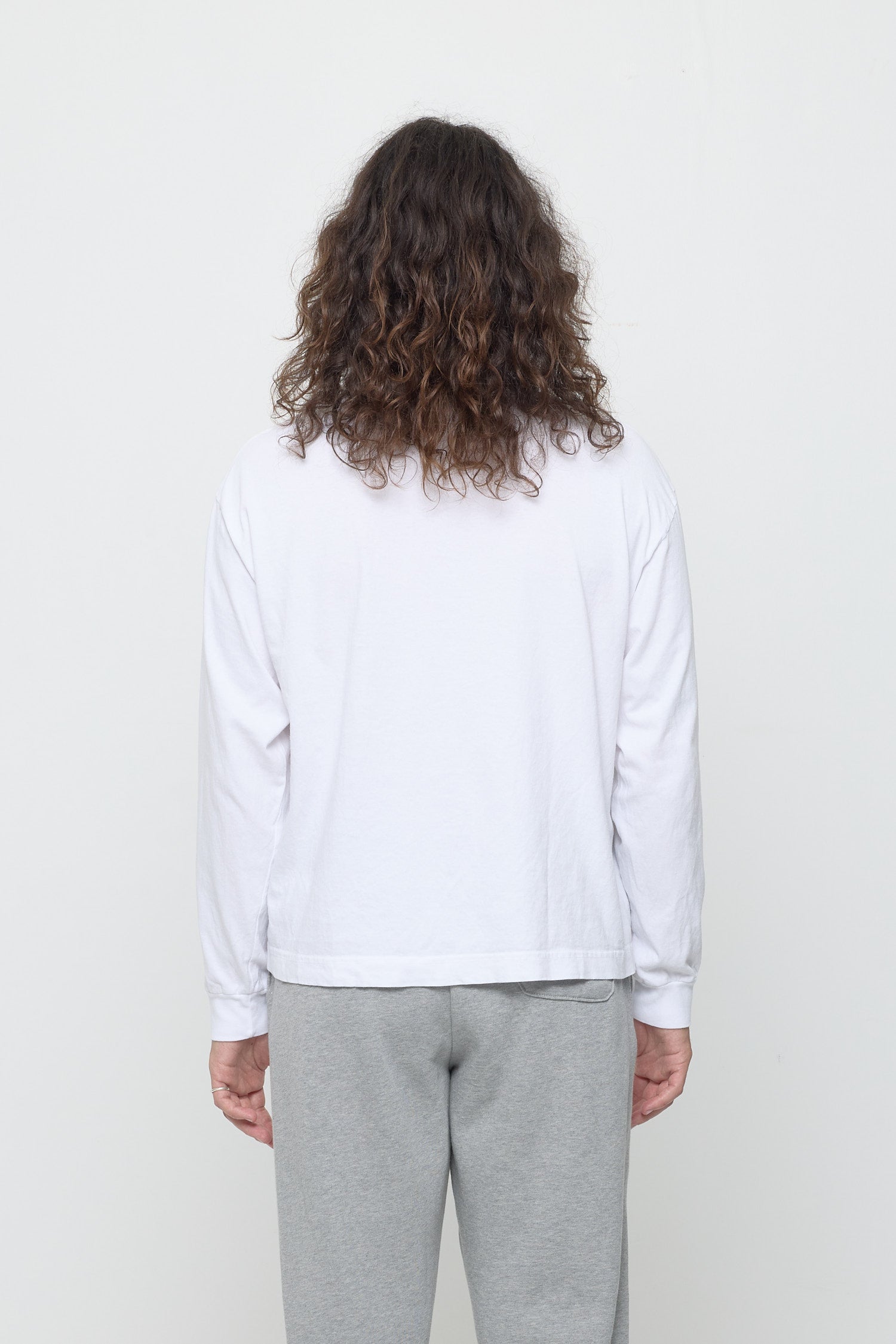 Back: shirt fabric relaxed and smooth with medium amount of ease.