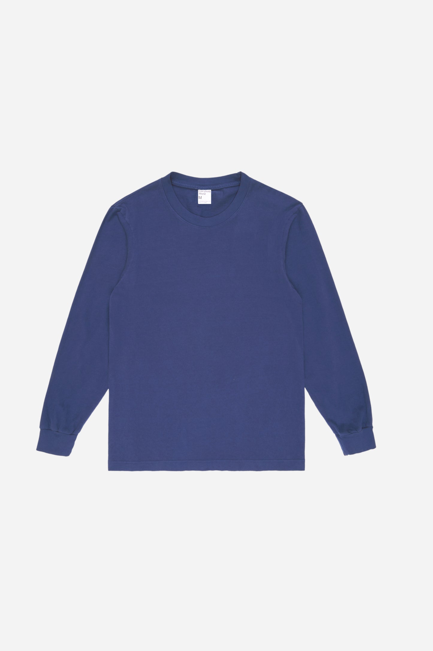 Flat lay of Washed Navy Long Sleeve Trash Tee showing the classic long sleeve tee silhouette.