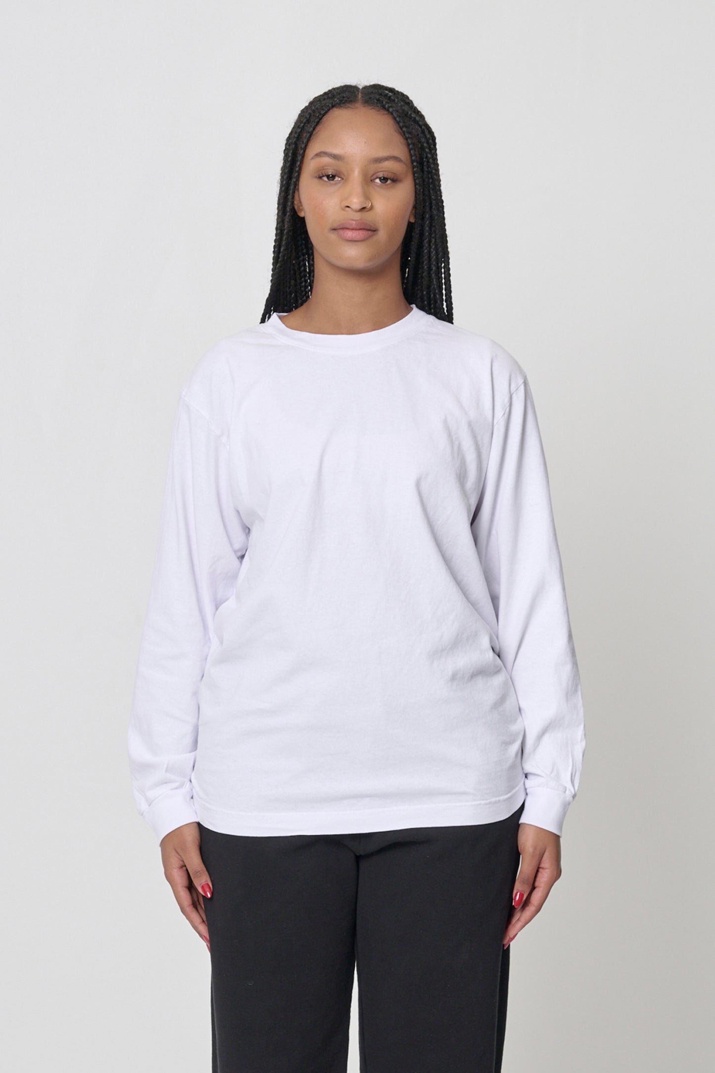 5'10" woman in a size M White Long Sleeve Trash Tee; shirt hem at lower-middle hip, arms at her sides.
