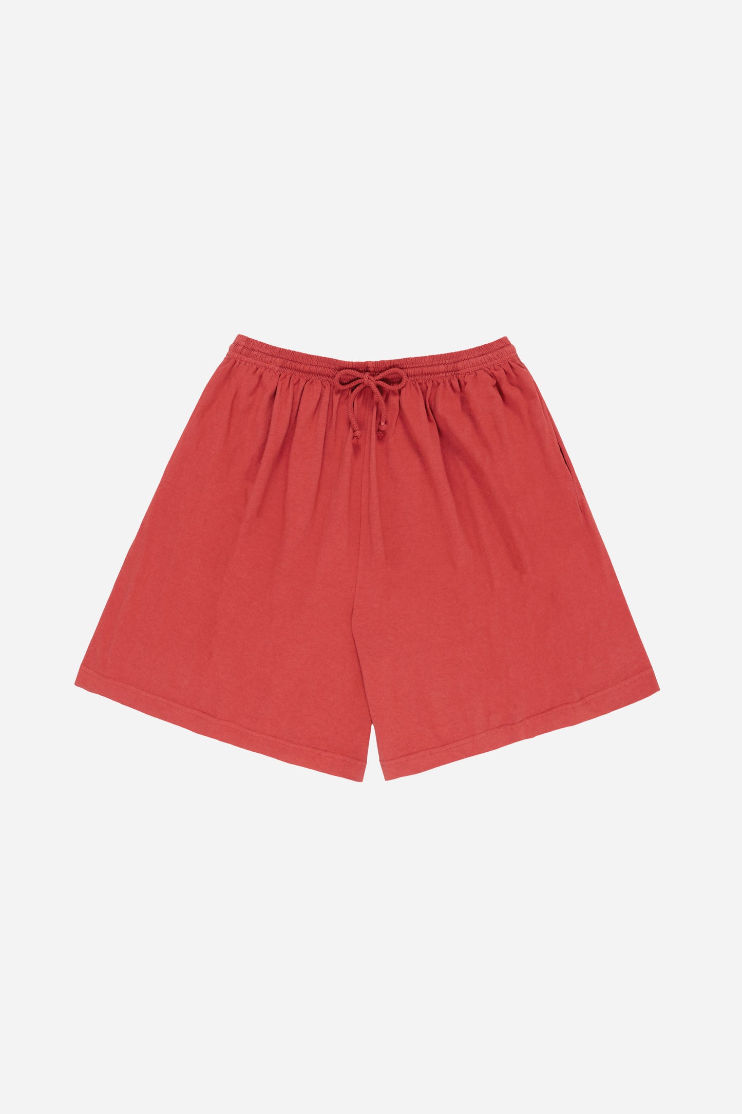 Flat lay of the Long Tubular Shorts in Cedar, showing the front of the wide-leg, knee-length shorts.