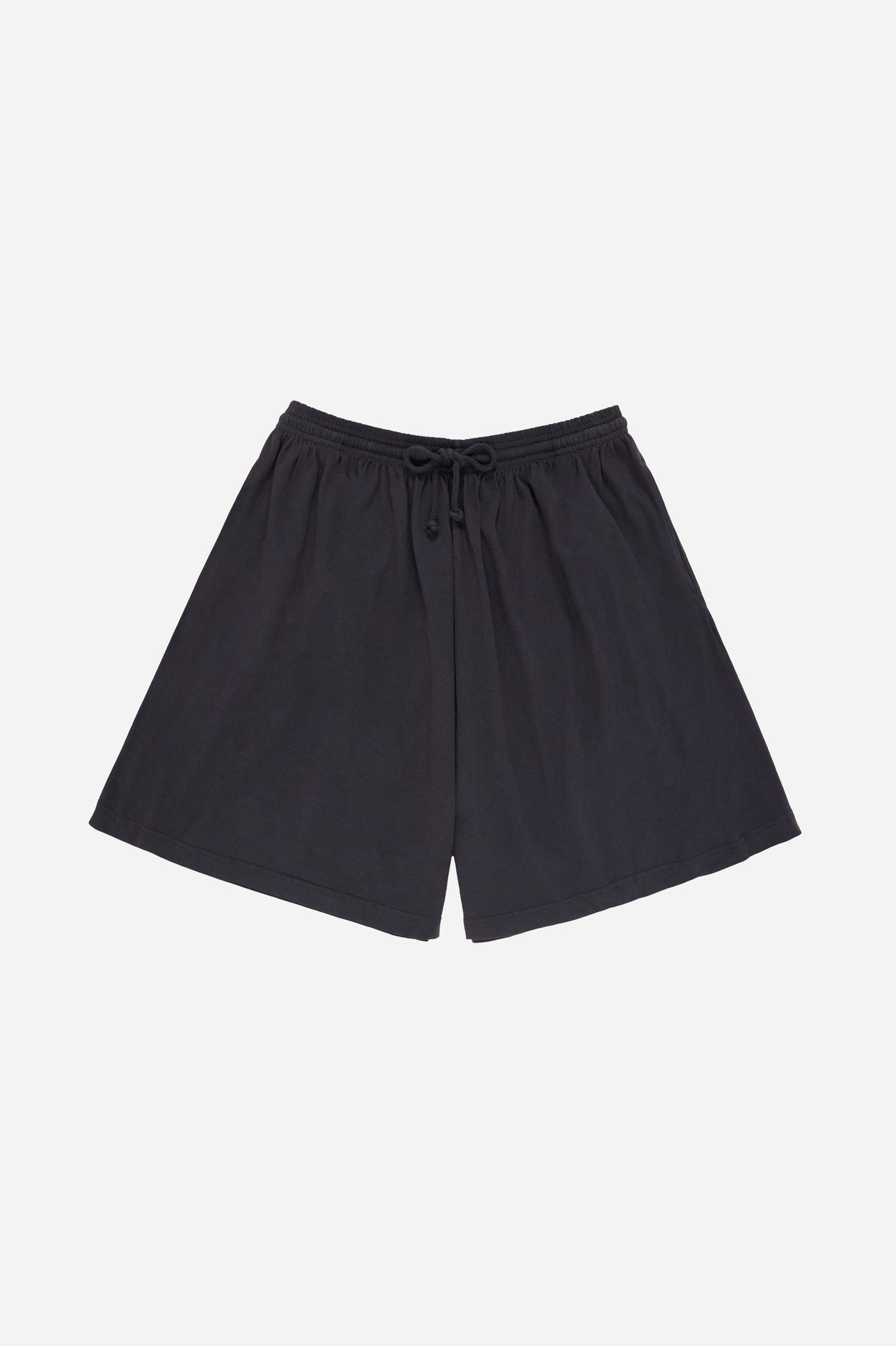 Flat lay of the Long Tubular Shorts in Slate, showing the front of the wide-leg, knee-length shorts.