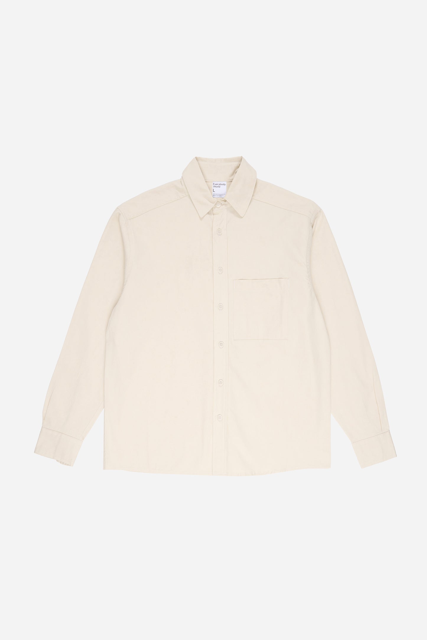 Flat lay of Oat buttoned up Peach Fuzz Twill Button-Up Shirt, front view.