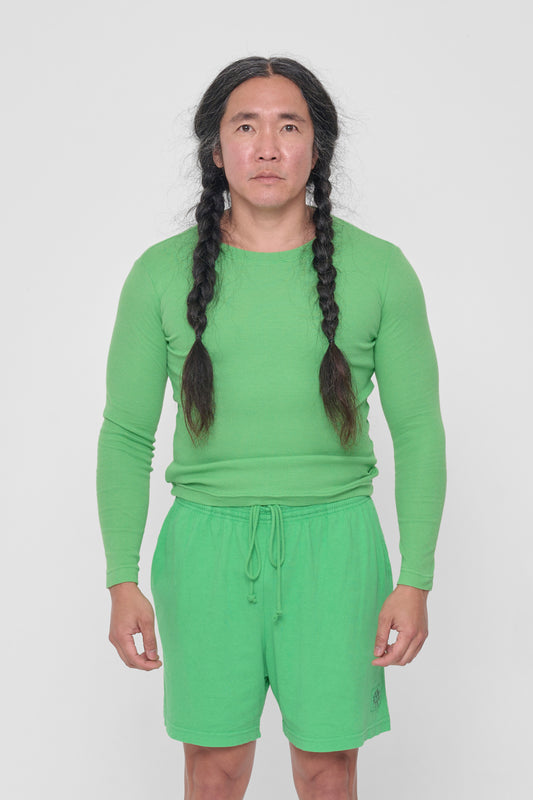 5'11" man wearing size XL Nice Grass Rib Long Sleeve. Hem hits at his hip.