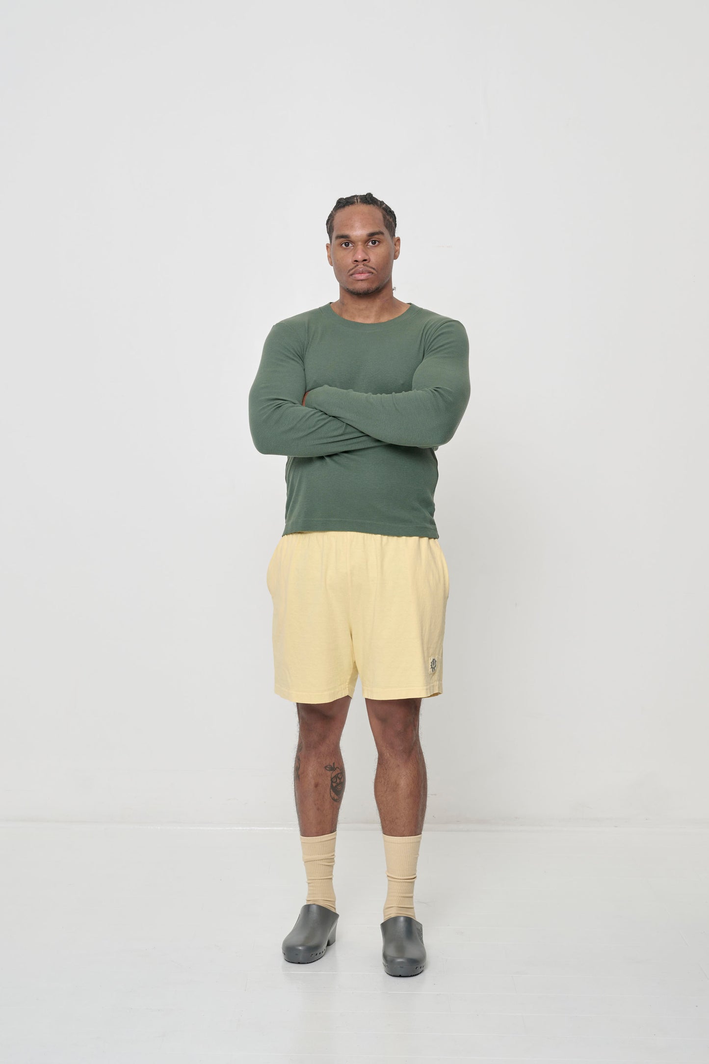 Pulled over the waistband of a French Butter pair of Everyday Shorts.