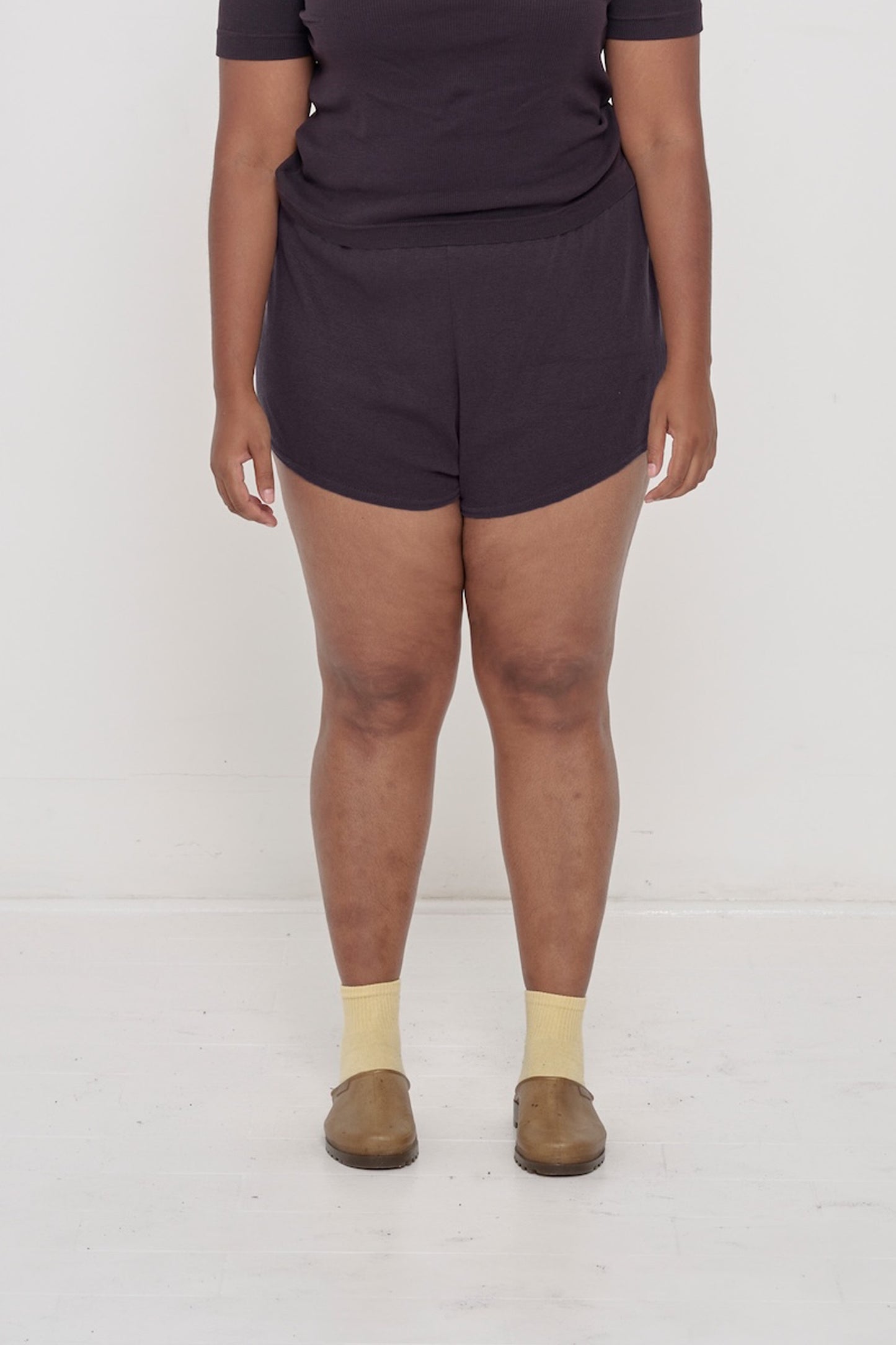 Mulberry Rib Shorts on model, front. Relaxed fit, upper-thigh length and elastic waist.