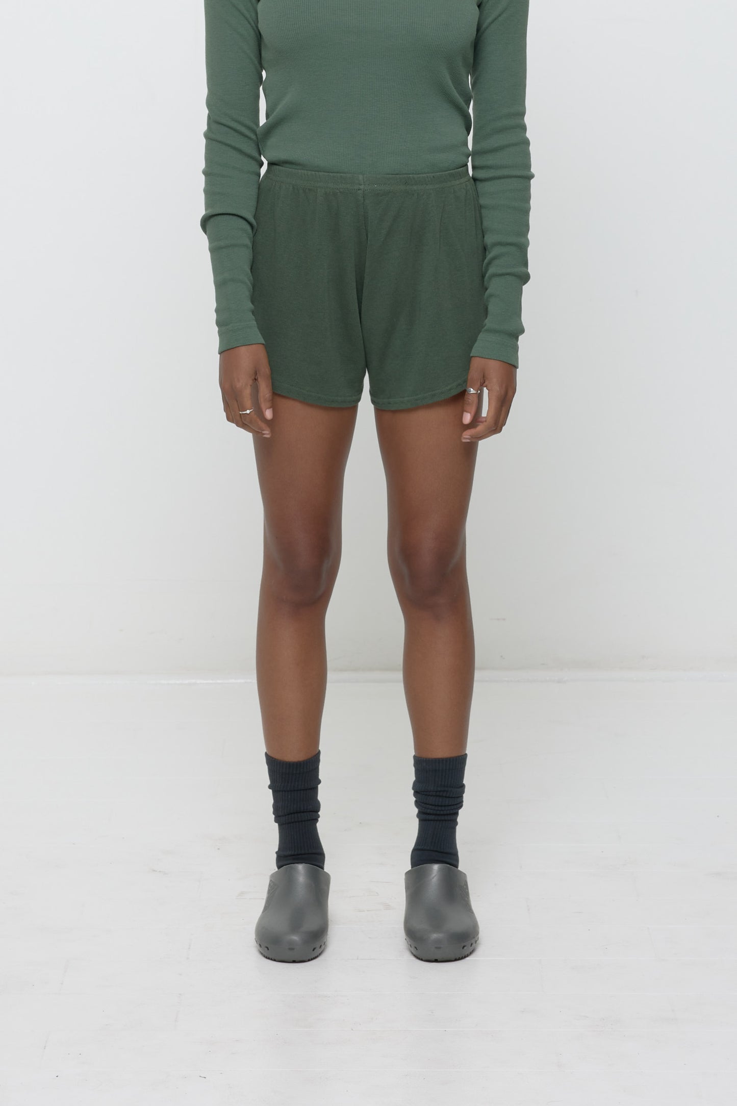 Pine Rib Shorts on model, front. Relaxed fit, upper-thigh length and elastic waist.