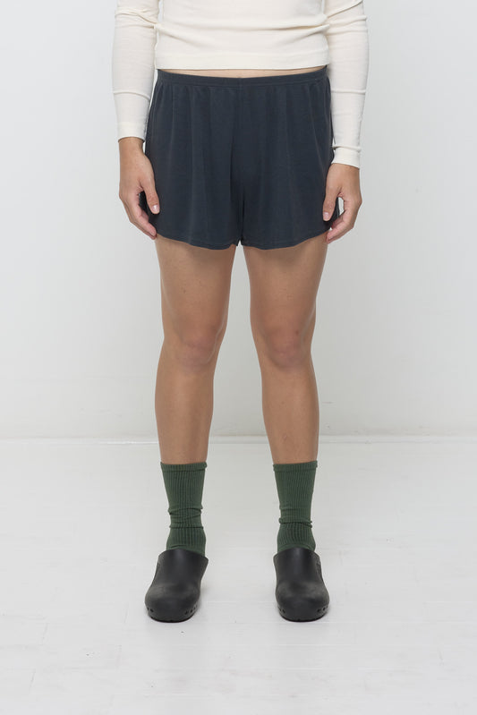 XL Slate Rib Shorts on a 6' model, front. Relaxed fit, upper-thigh length and elastic waist.